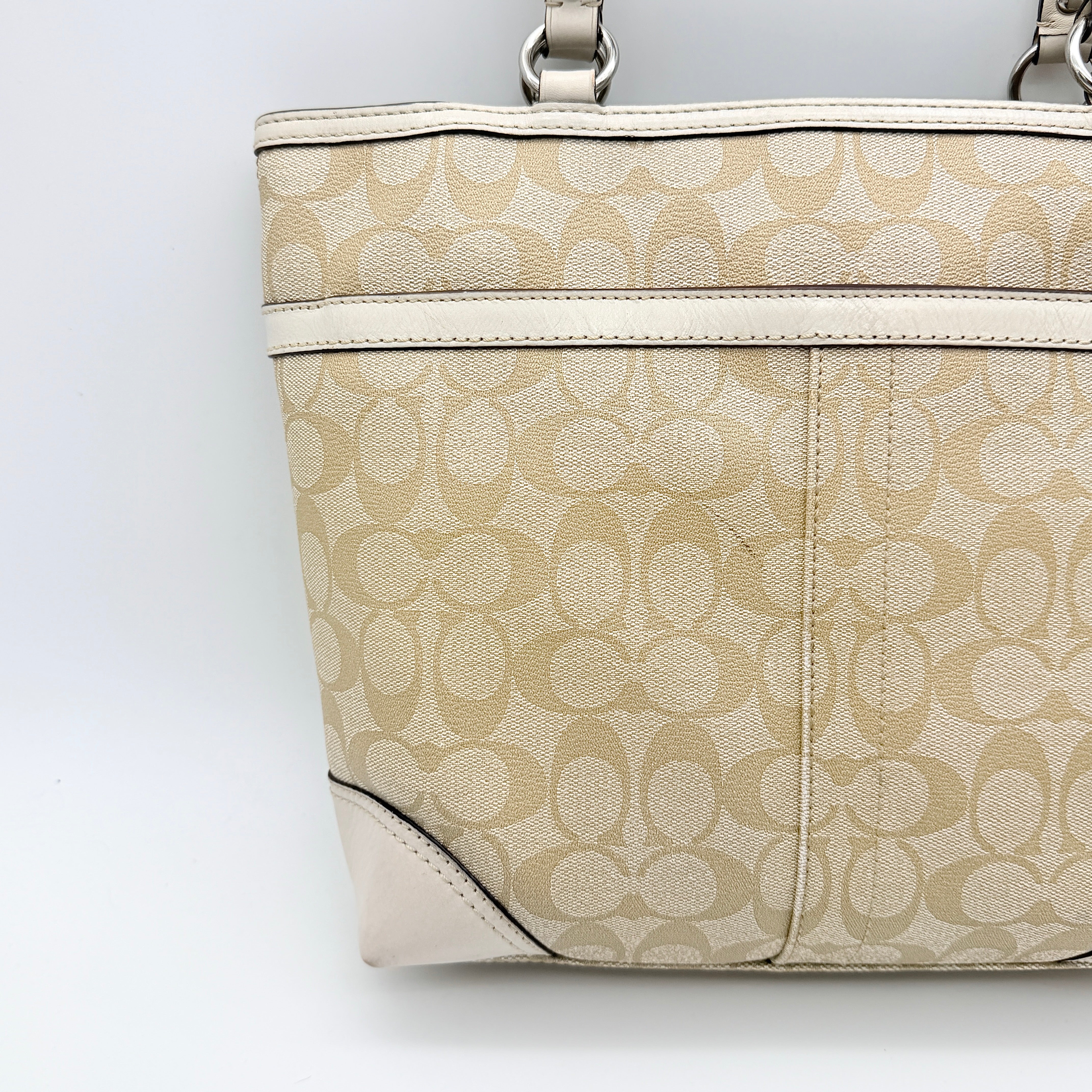 Coach Signature Chelsea Heritage Stripe Tote in beige with pink and cream accents, finished with dual-colour hangtag and leather trim.