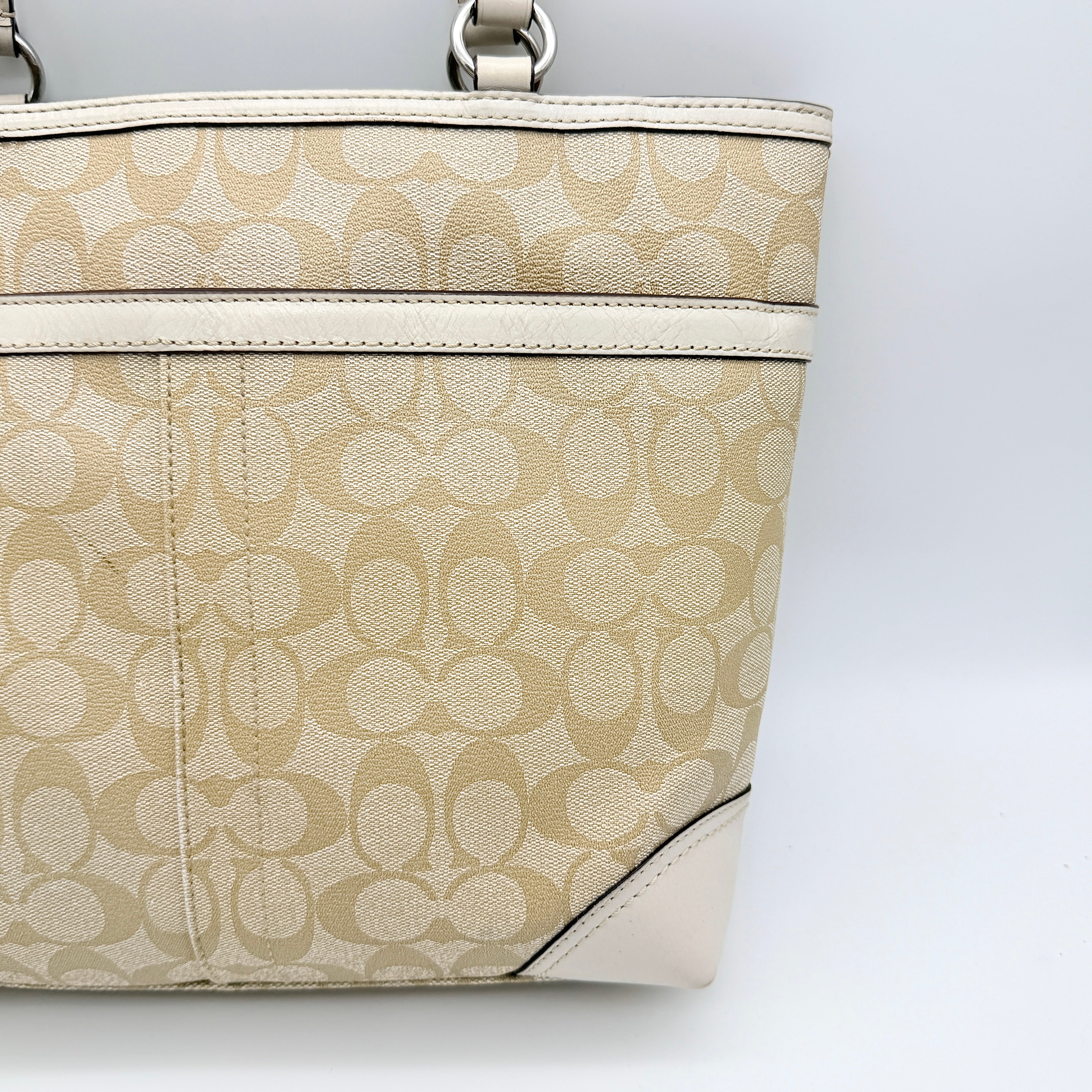 Coach Signature Chelsea Heritage Stripe Tote in beige with pink and cream accents, finished with dual-colour hangtag and leather trim.