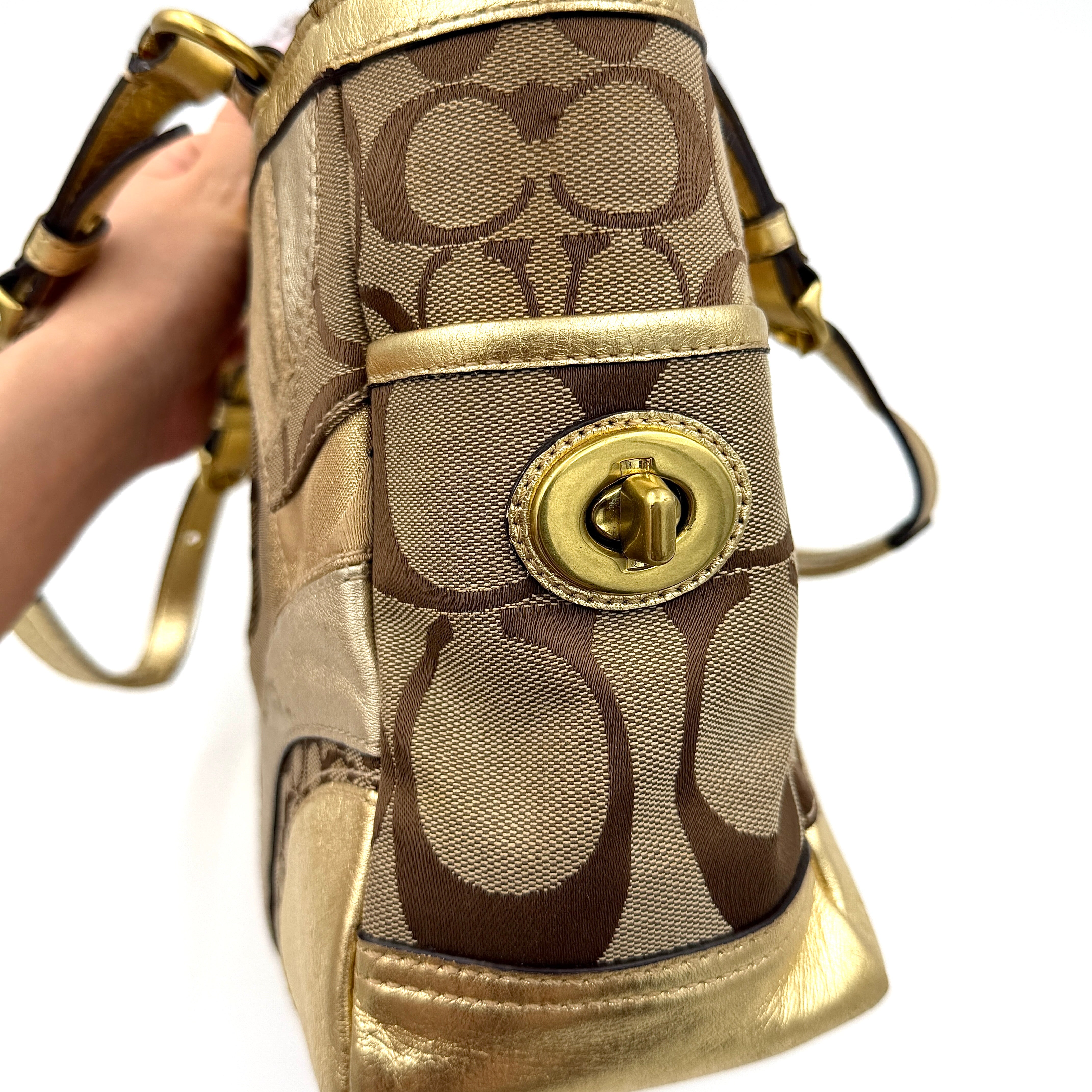 Coach Gallery Tote in a geometric patchwork of gold, beige, and tan with signature monogram and metallic leather against a white background.