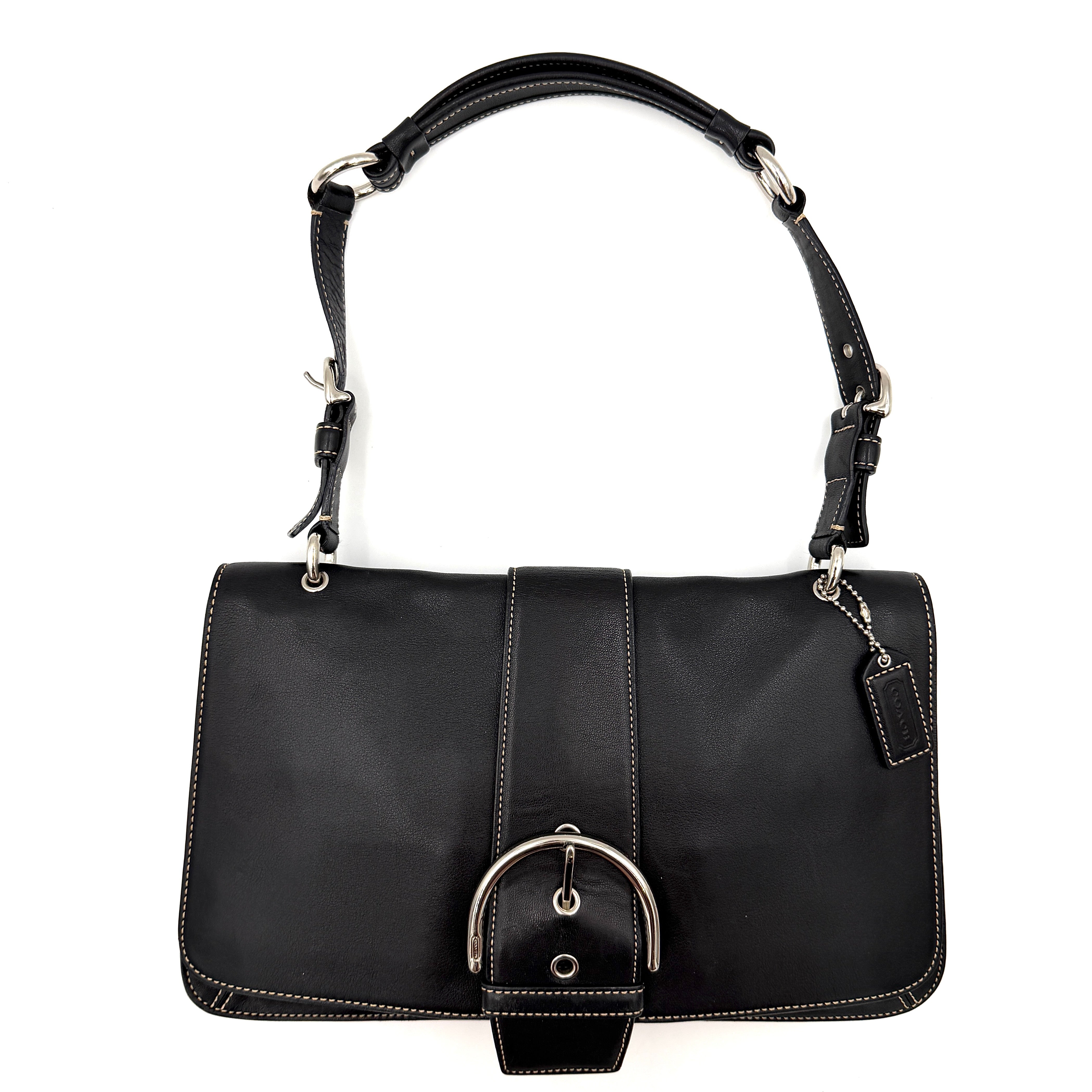 Coach Y2K Soho Buckle Shoulder Bag in smooth black leather with contrast stitching and a bold silver horseshoe buckle.