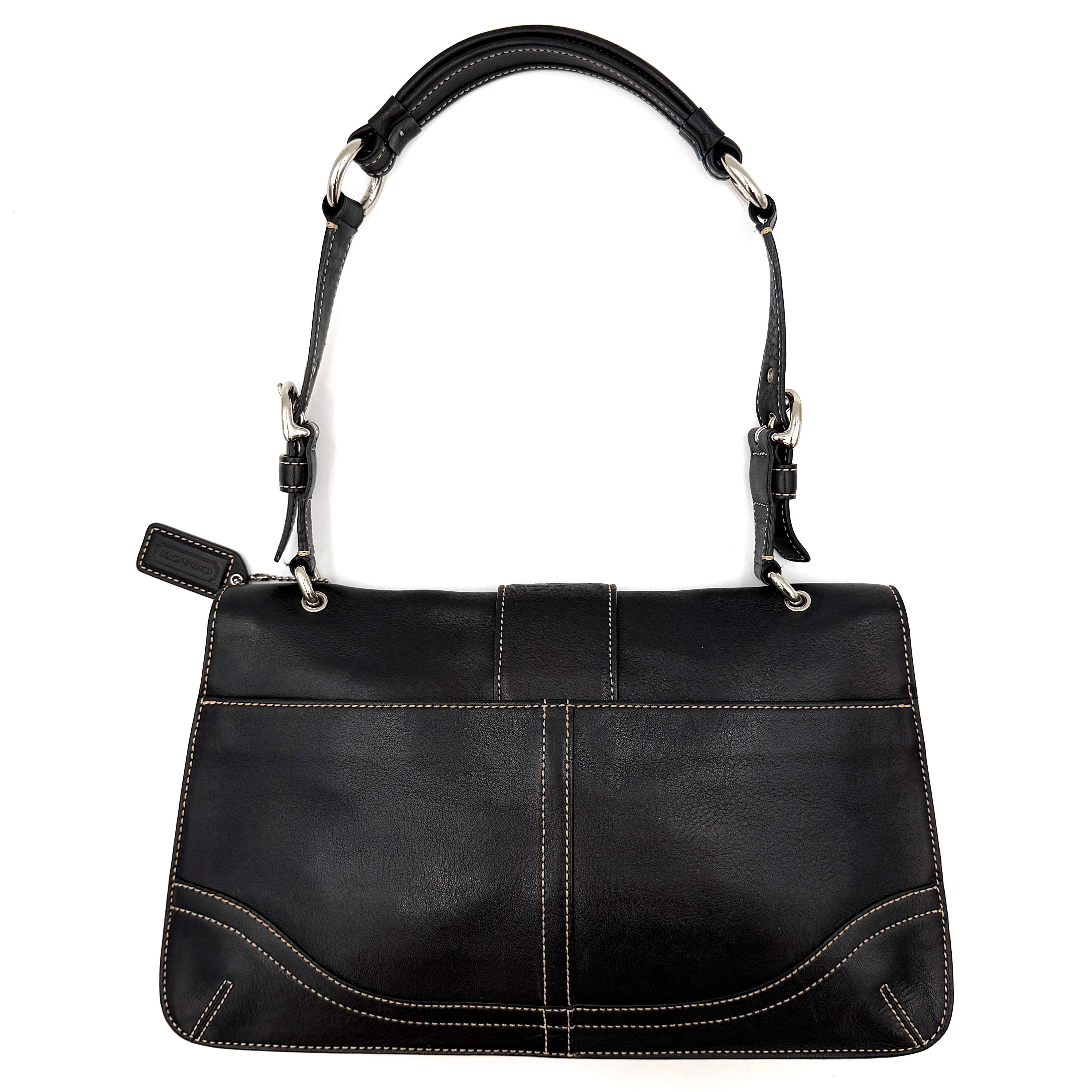 Coach Y2K Soho Buckle Shoulder Bag in smooth black leather with contrast stitching and a bold silver horseshoe buckle.