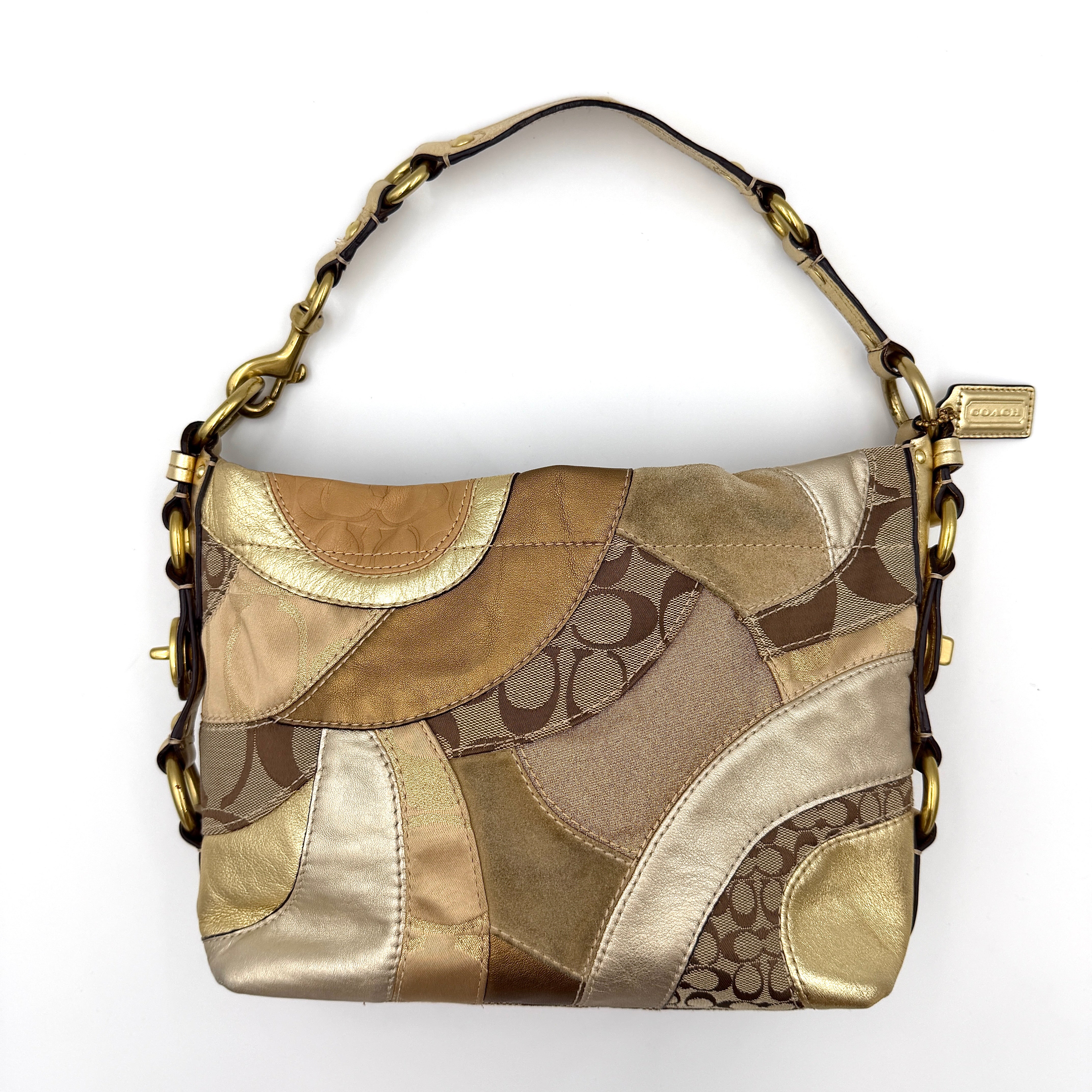 Coach Carly Patchwork Shoulder Bag in a blend of metallic gold, beige, and signature jacquard with gold hardware and a curved chain-link strap.