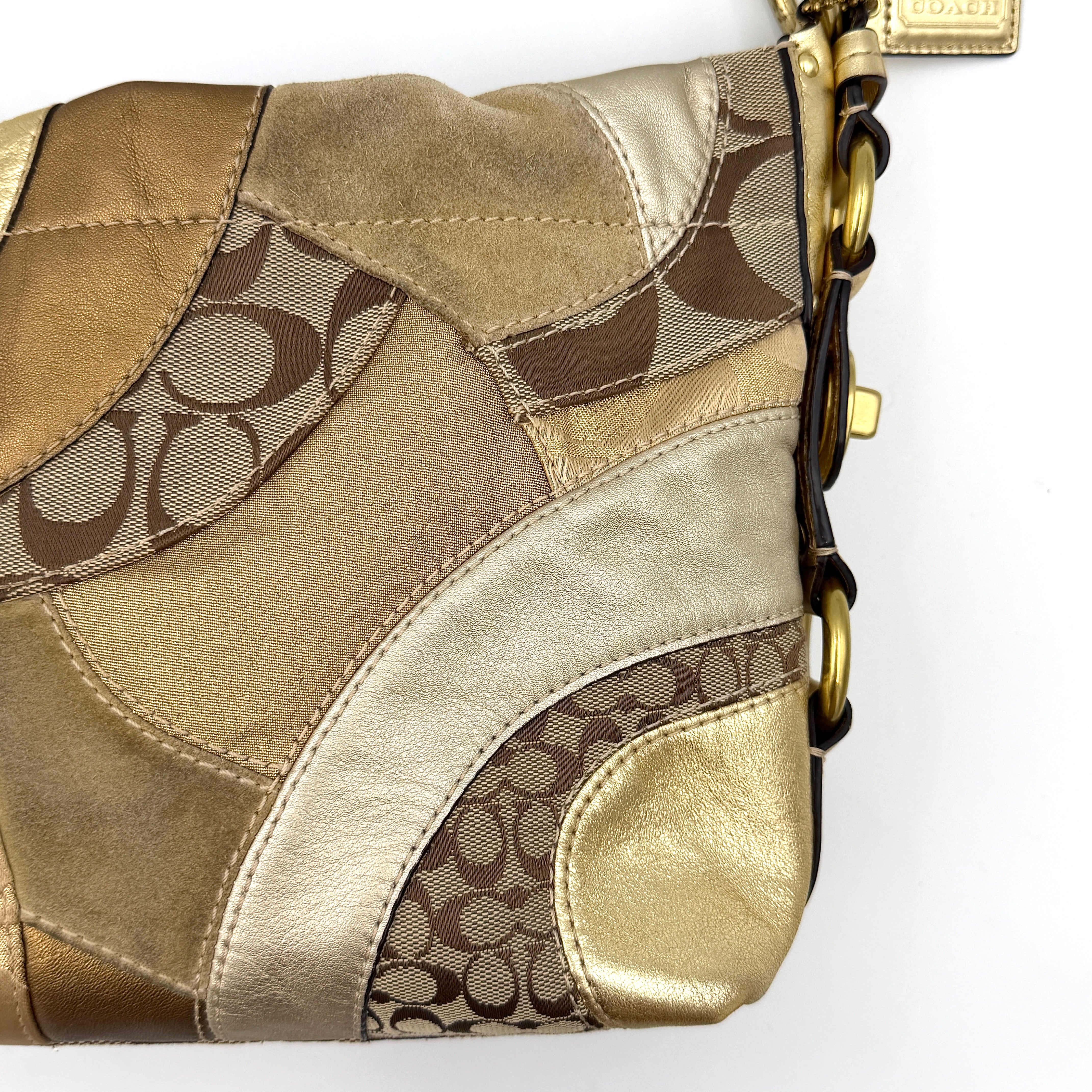 Coach Carly Patchwork Shoulder Bag in a blend of metallic gold, beige, and signature jacquard with gold hardware and a curved chain-link strap.