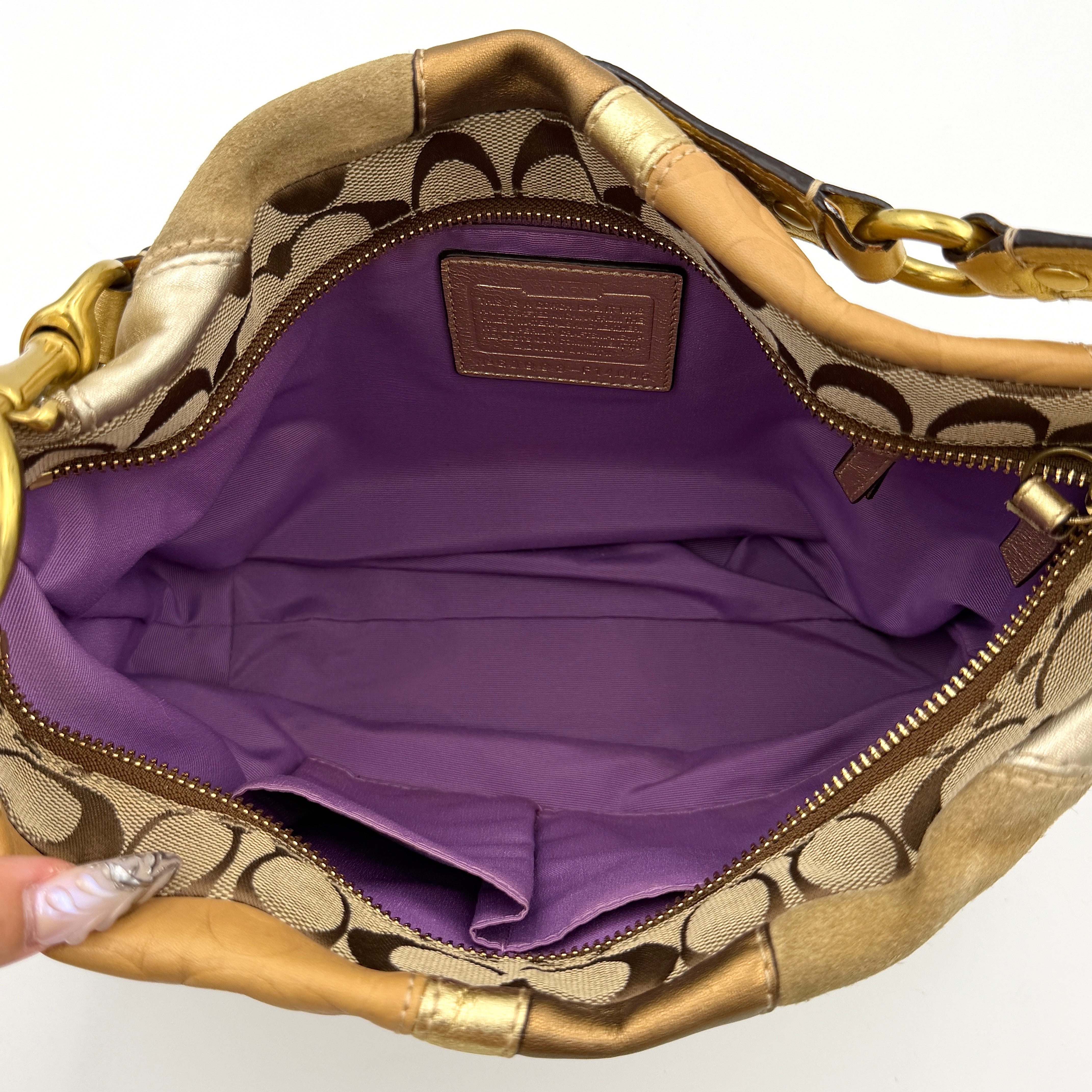 Coach Carly Patchwork Shoulder Bag in a blend of metallic gold, beige, and signature jacquard with gold hardware and a curved chain-link strap.