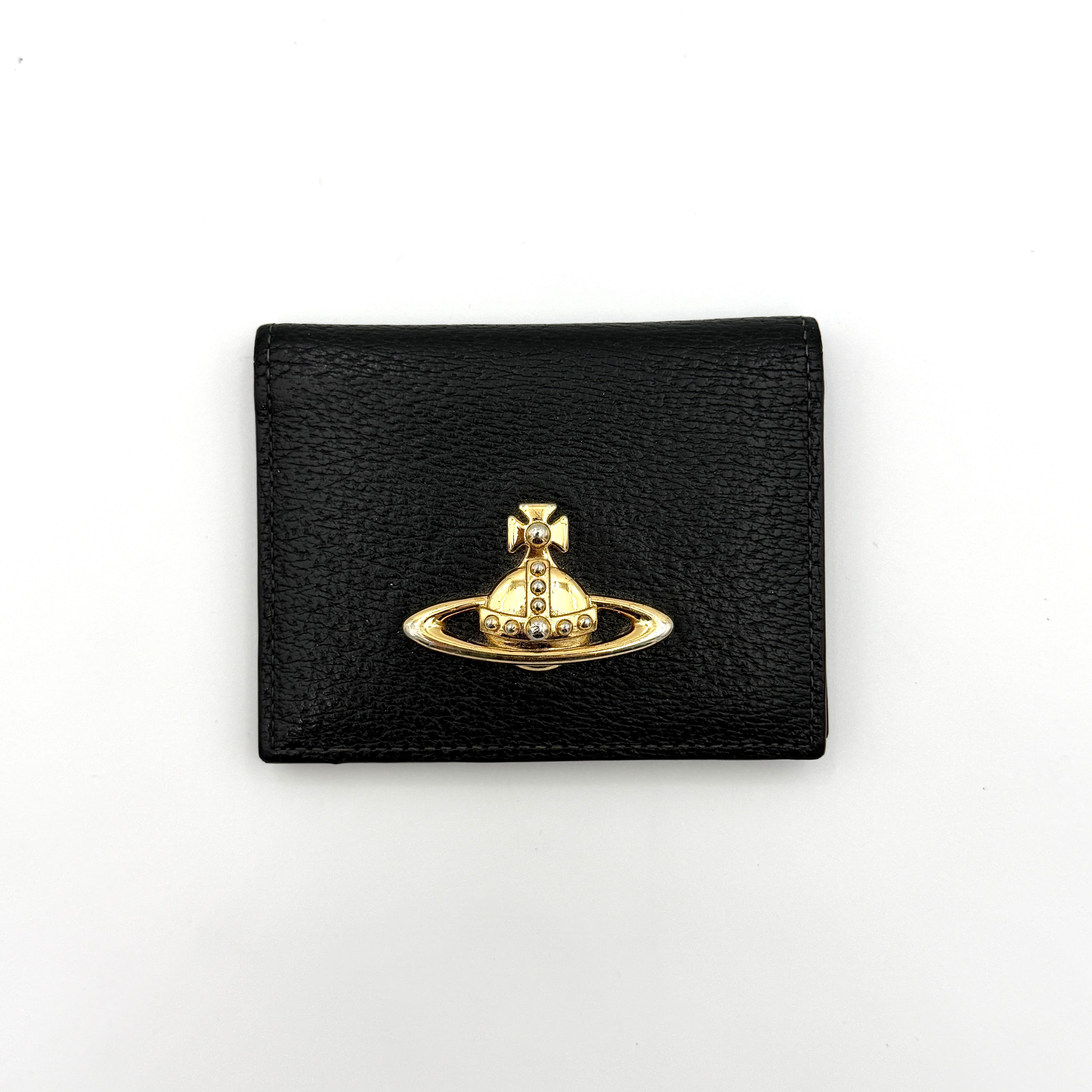 Vivienne Westwood black grained leather cardholder with gold orb emblem on the front flap.