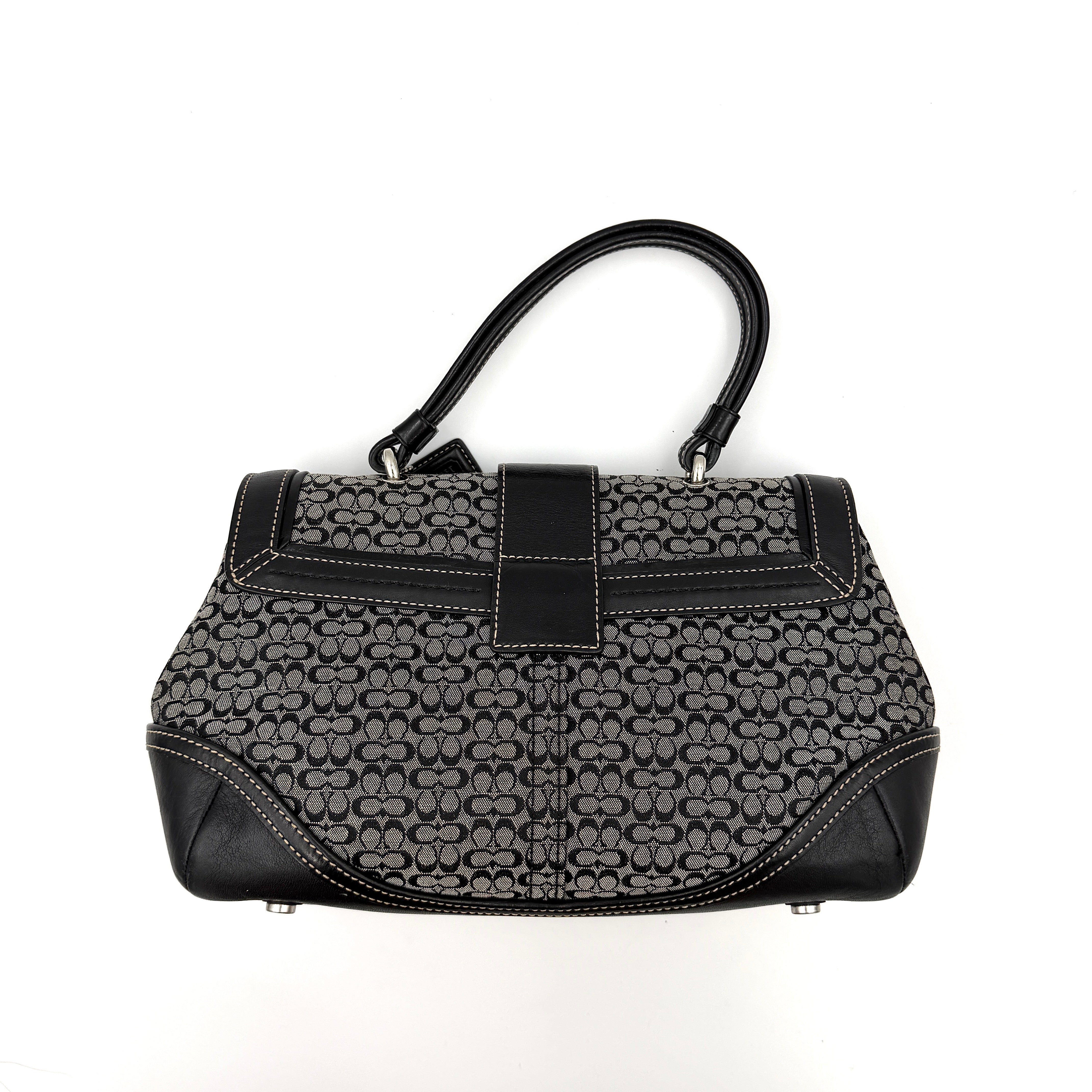Coach Y2K Signature Soho Shoulder Bag in grey and black canvas with black leather trim and silver hardware, top handle style.