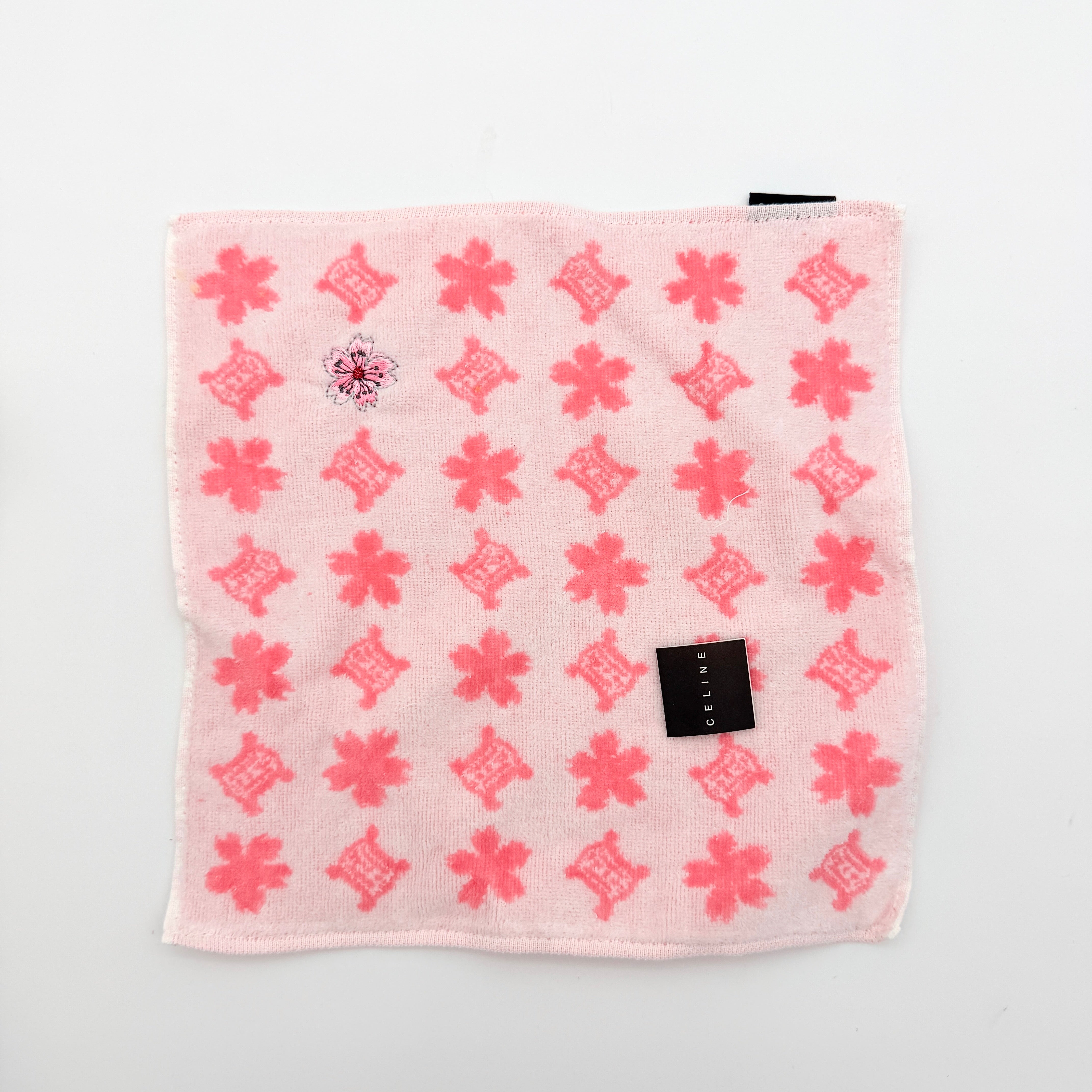 Celine Triomphe Monogram pink pouch set with Macadam Sakura towel, presented in the original Celine box.