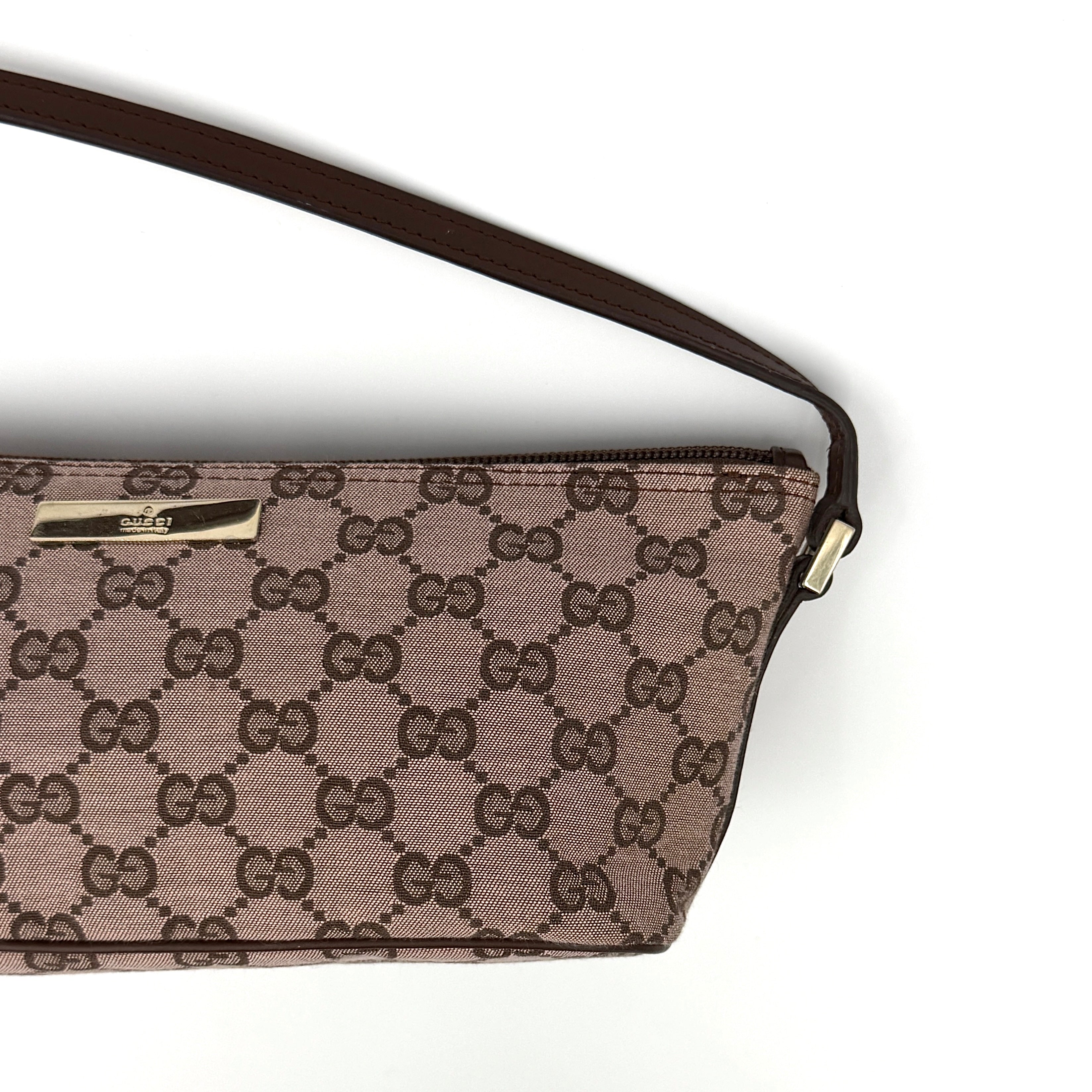 Gucci GG Monogram Pochette Boat Shoulder Bag in light brown canvas with gold-tone hardware and brown leather strap.