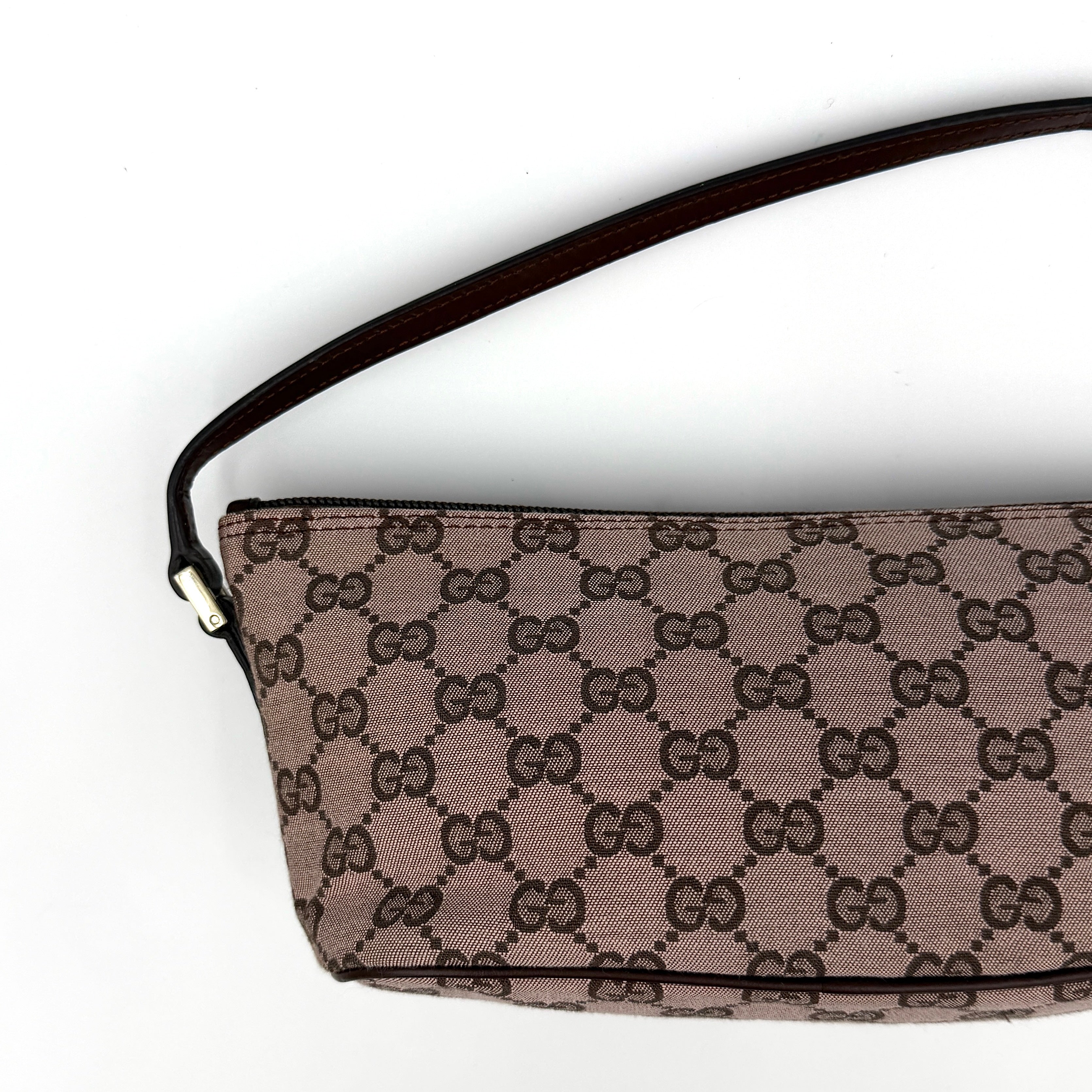 Gucci GG Monogram Pochette Boat Shoulder Bag in light brown canvas with gold-tone hardware and brown leather strap.