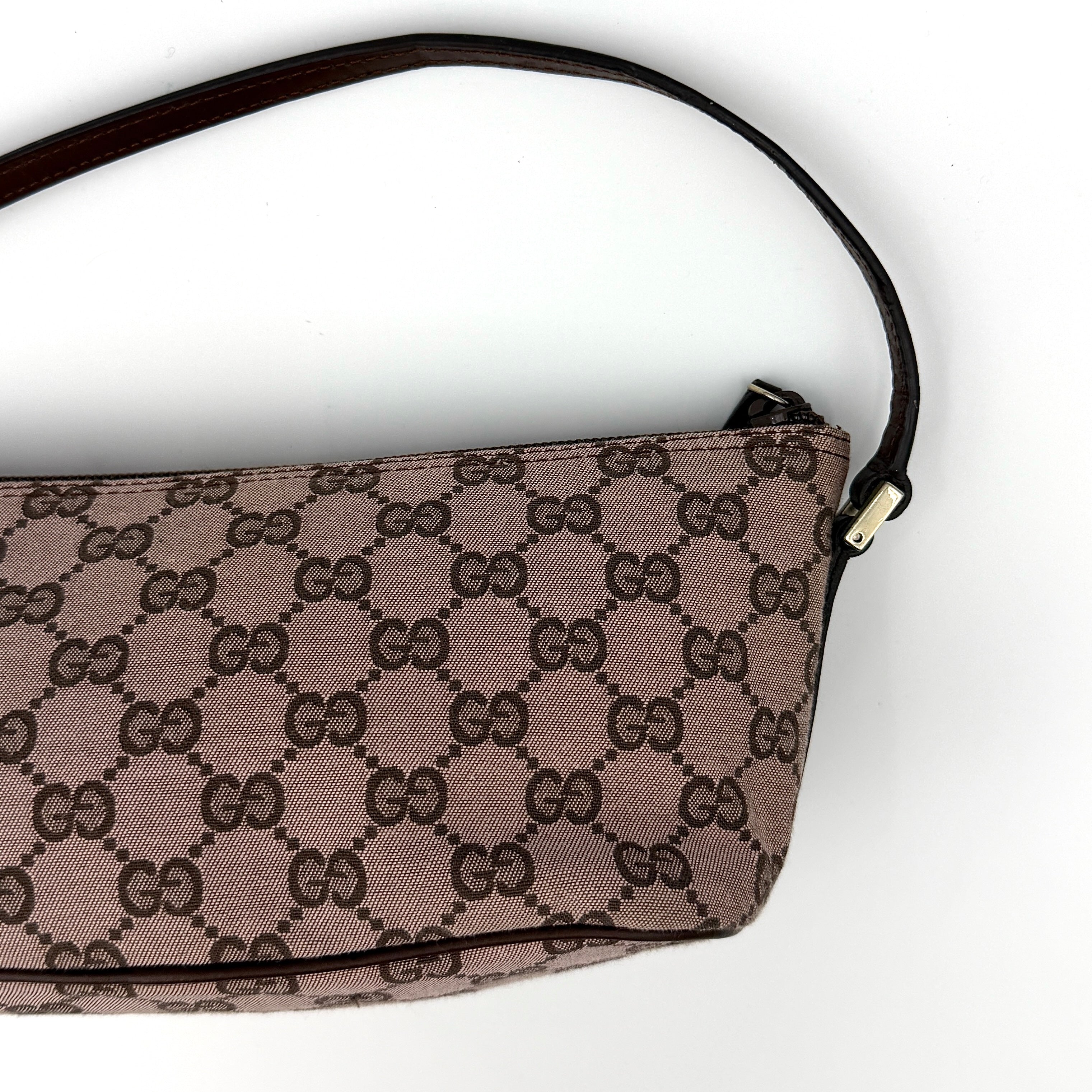 Gucci GG Monogram Pochette Boat Shoulder Bag in light brown canvas with gold-tone hardware and brown leather strap.