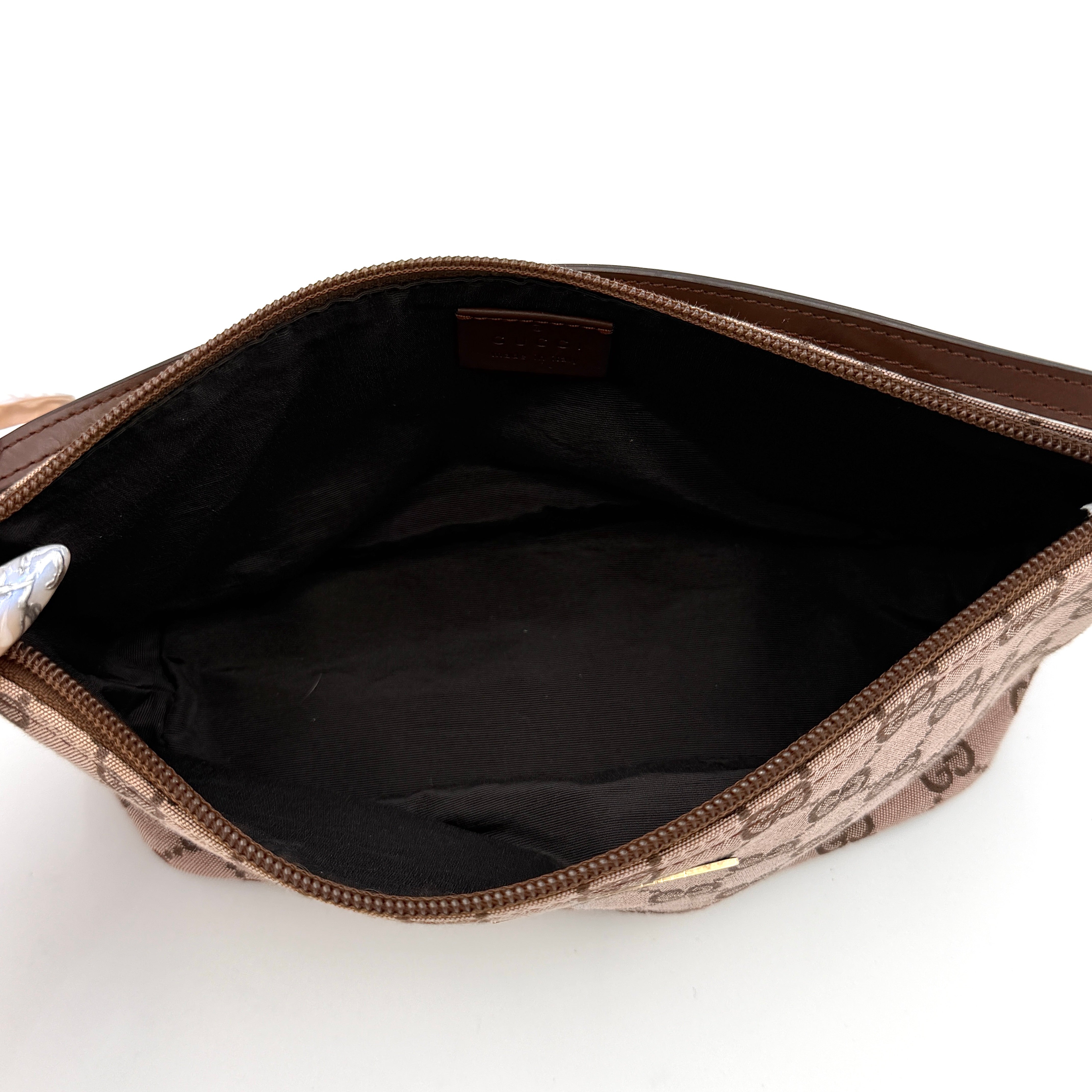 Gucci GG Monogram Pochette Boat Shoulder Bag in light brown canvas with gold-tone hardware and brown leather strap.