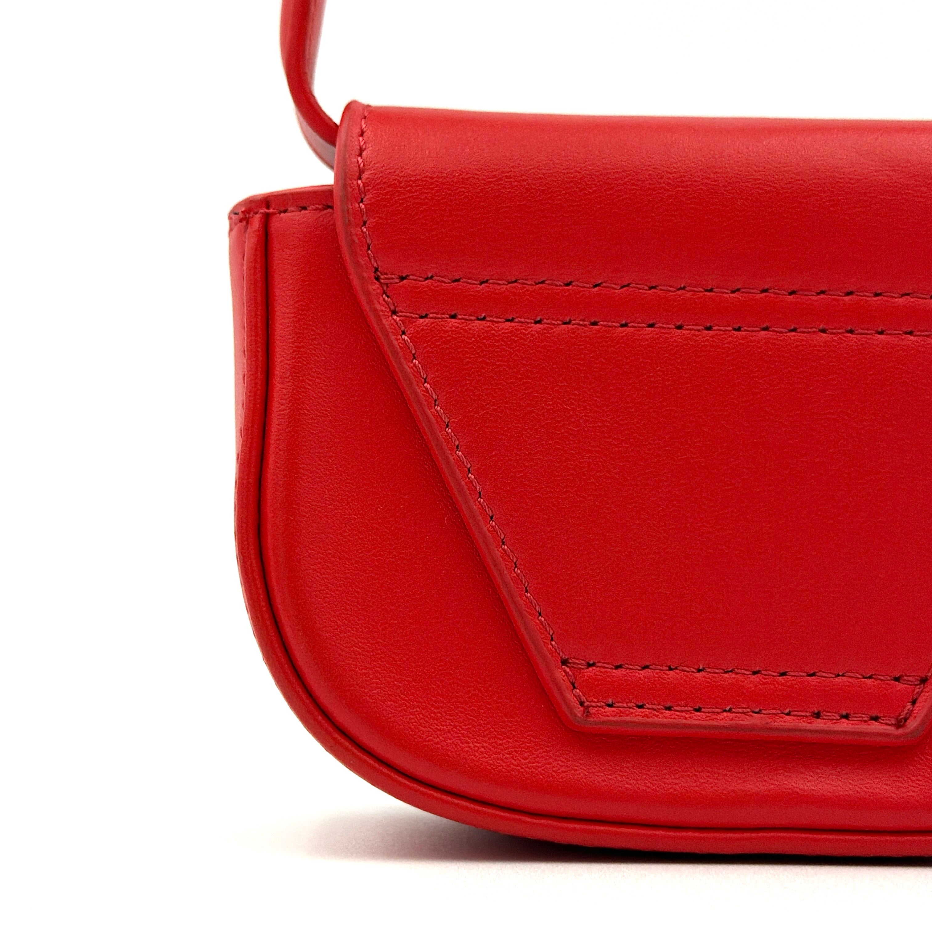 Diesel 2Way 1DR-XS Mini Bag in striking red leather with bold silver D logo, paired with a detachable matching strap.