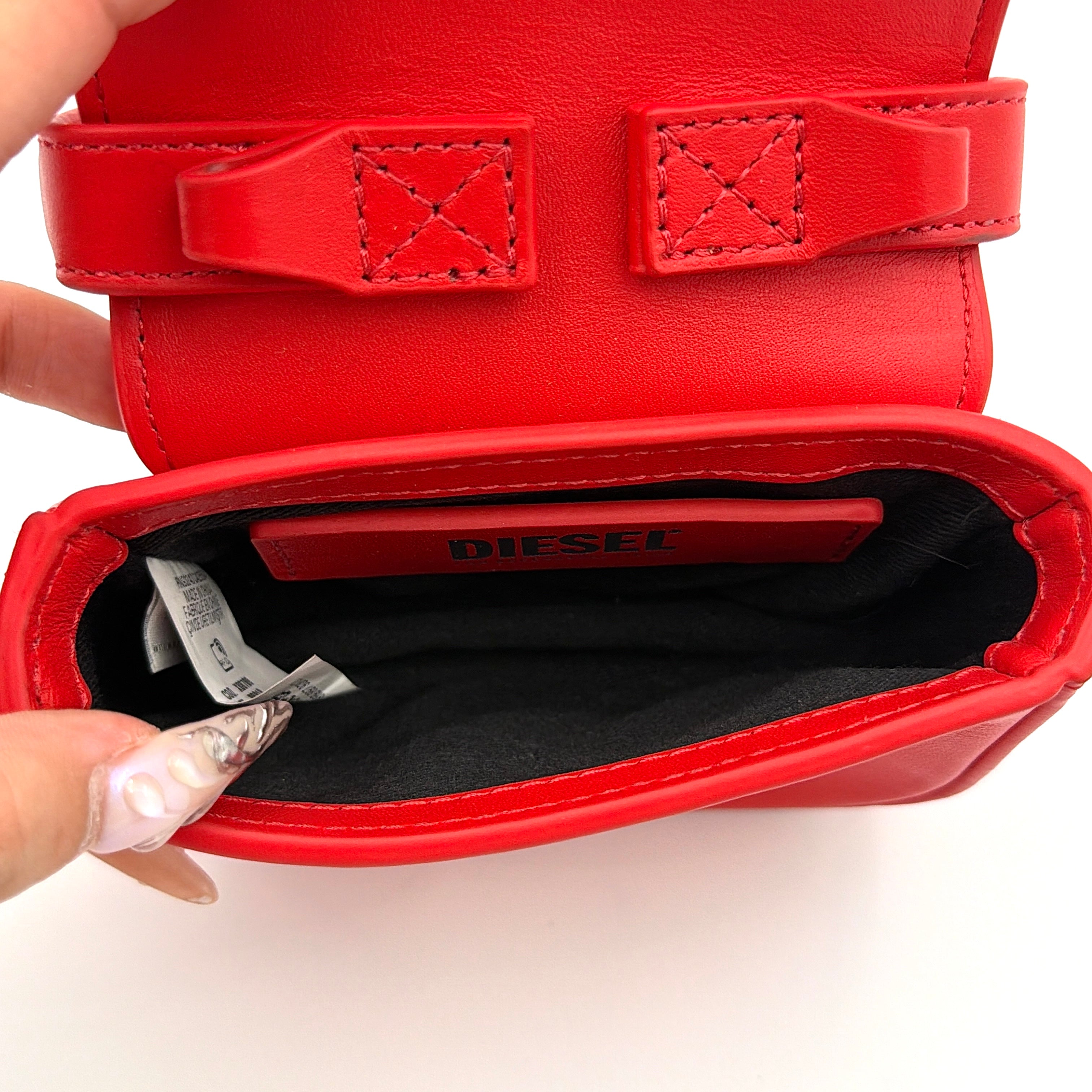 Diesel 2Way 1DR-XS Mini Bag in striking red leather with bold silver D logo, paired with a detachable matching strap.