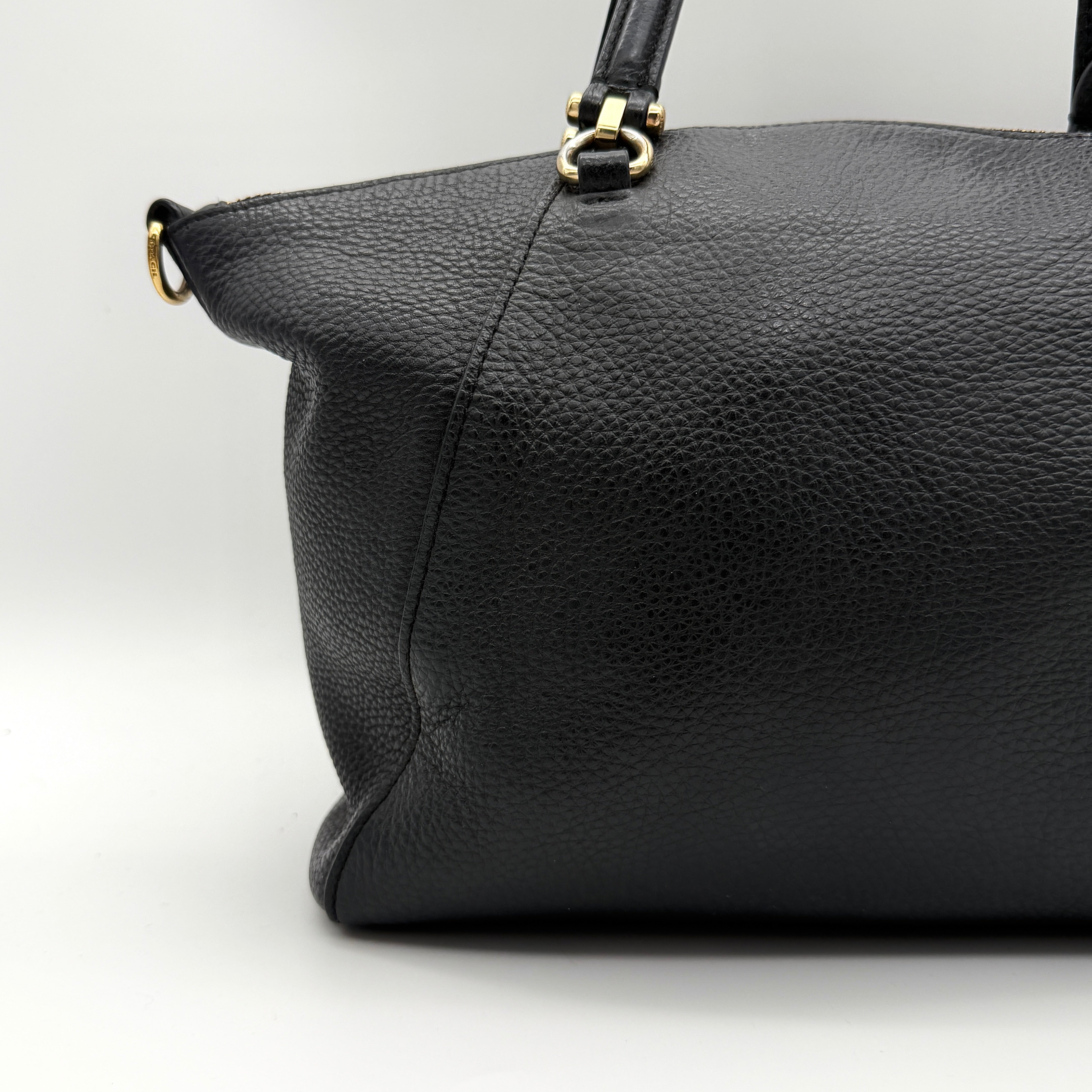 Coach 2Way Prairie Satchel in black grained leather with gold-tone hardware, shown with detachable strap and branded dust bag.