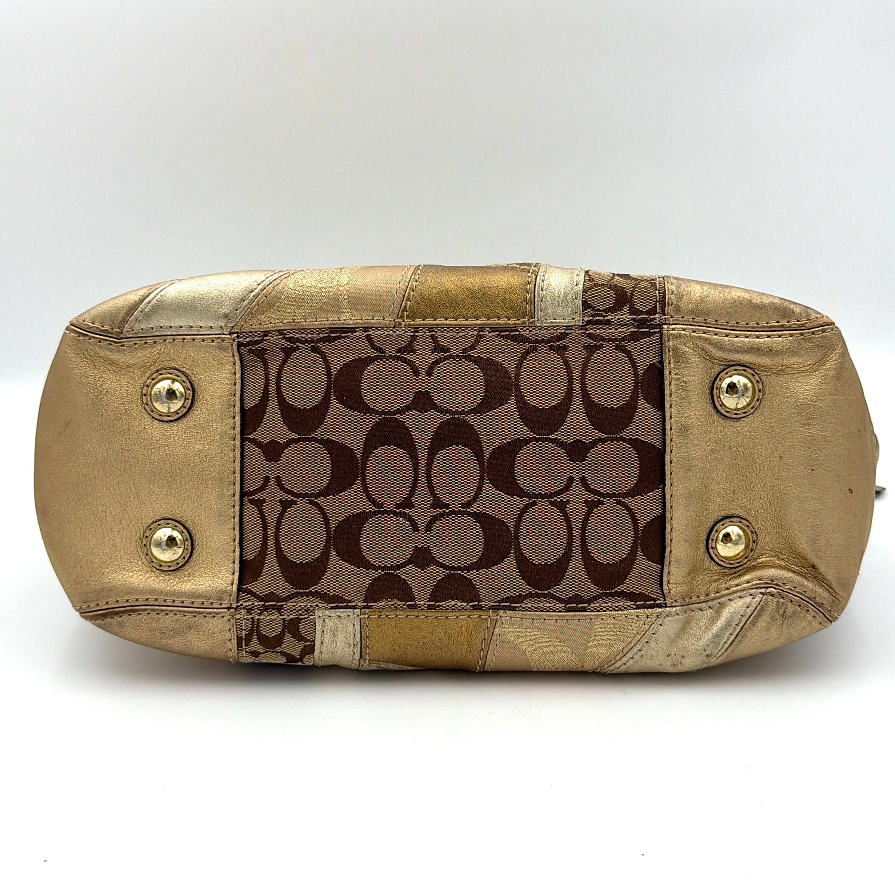 Coach Gallery Tote in mosaic patchwork jacquard and gold leather with signature charms and adjustable handles.