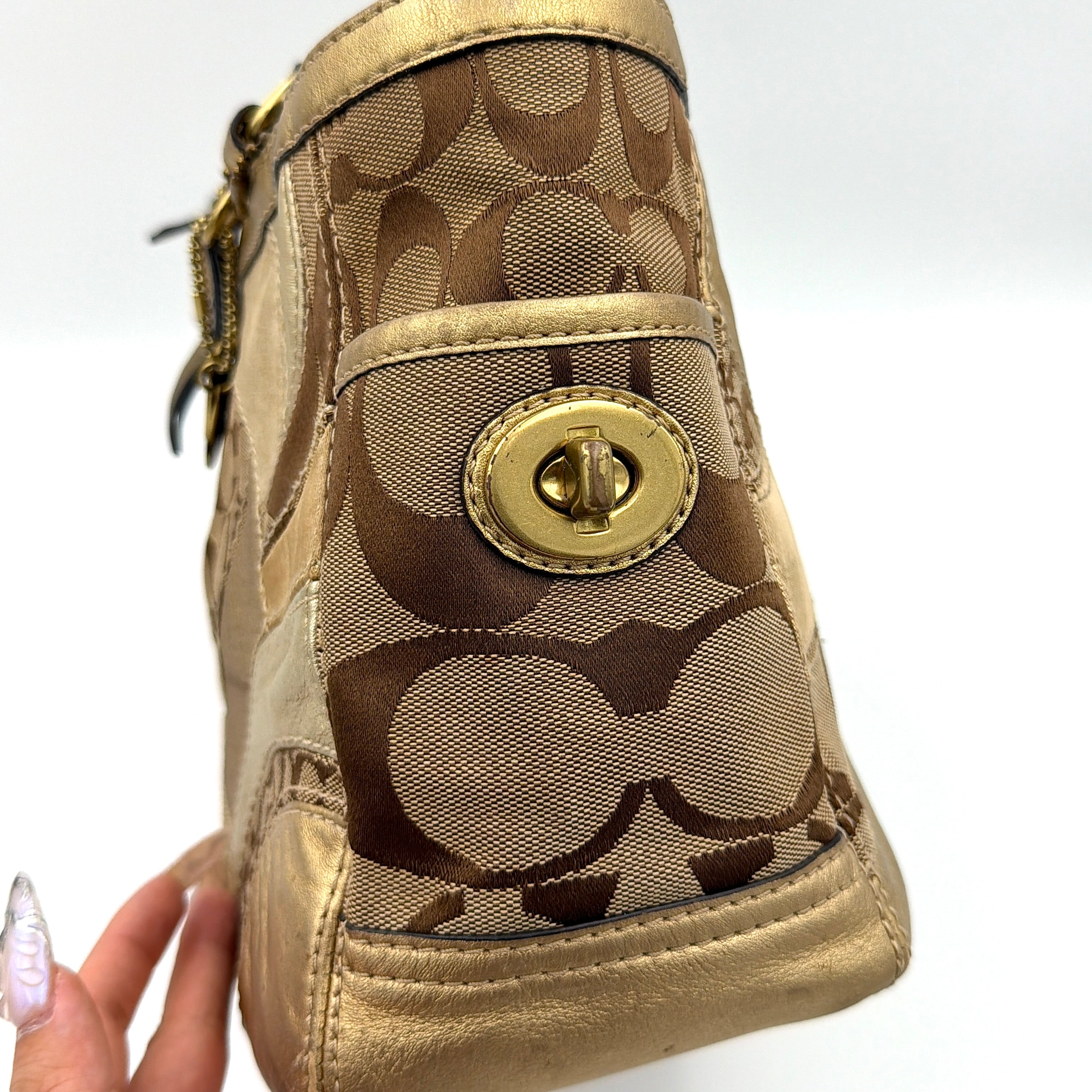 Coach Gallery Tote in mosaic patchwork jacquard and gold leather with signature charms and adjustable handles.