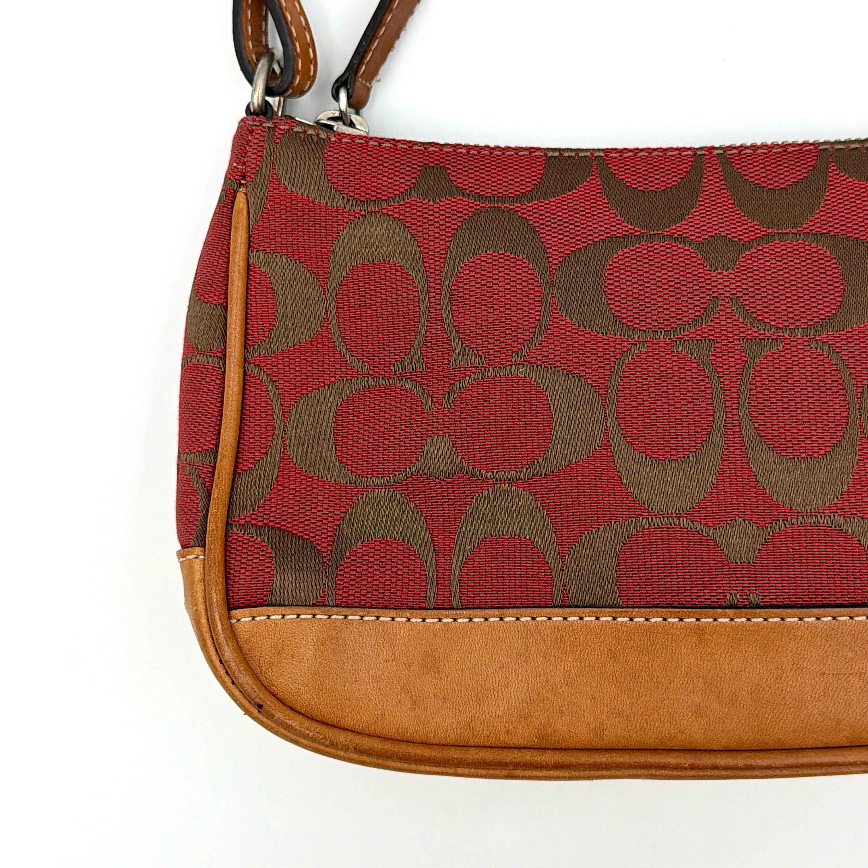 Coach Y2K Demi Shoulder Bag in red jacquard canvas with tan leather trim and silver-tone hardware, featuring a signature enamel Coach hangtag.