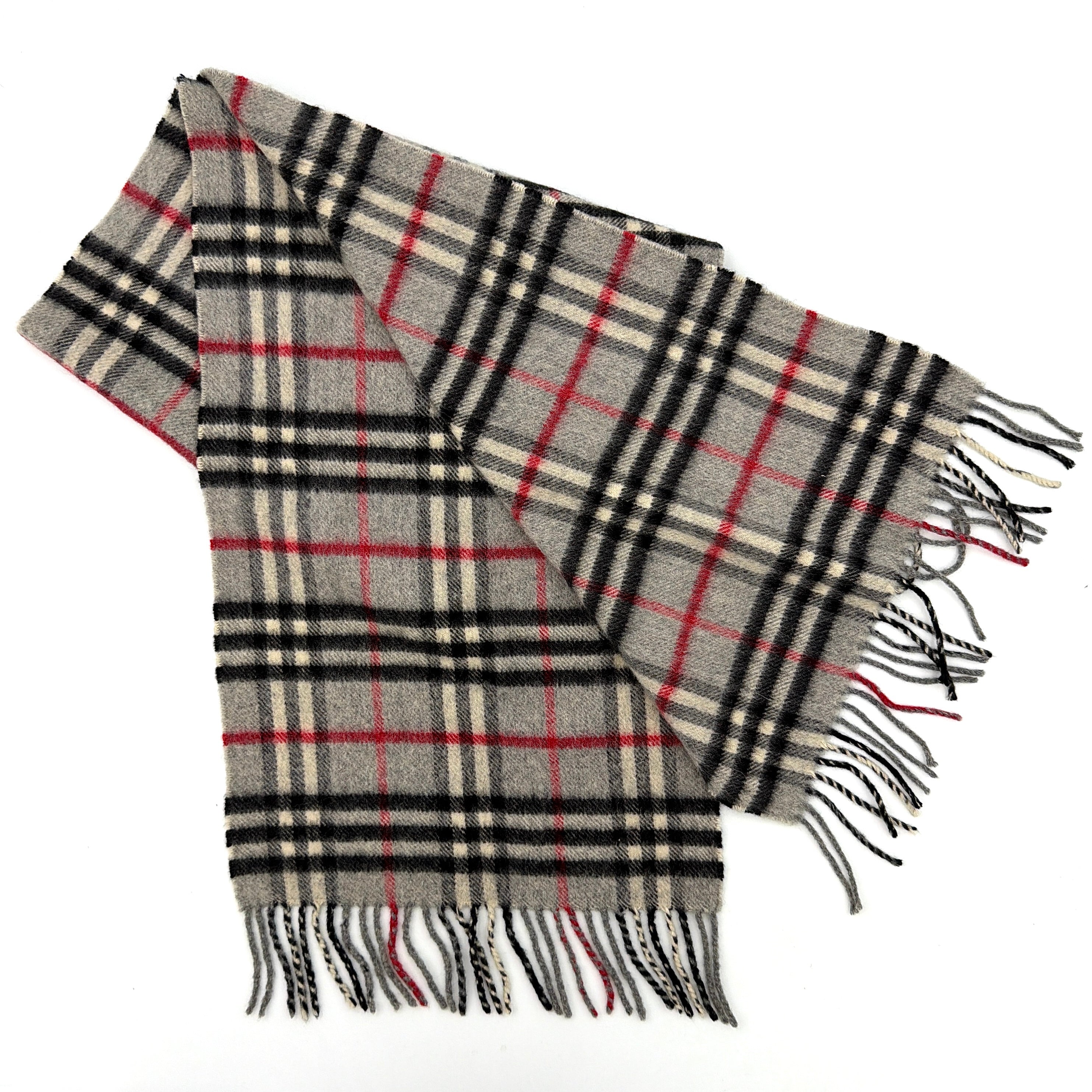 Burberry London scarf in grey cashmere with signature Nova Check pattern and twisted fringe detailing.