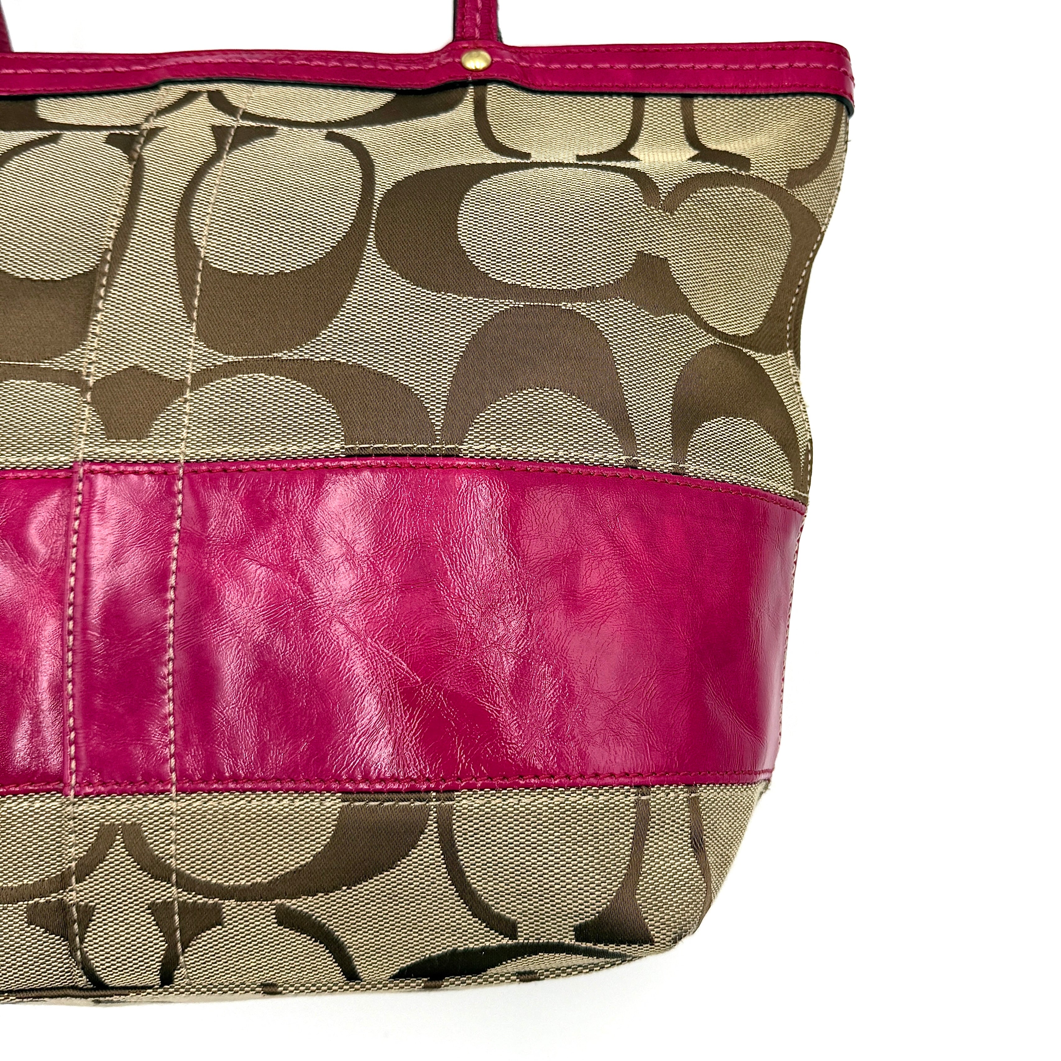Coach Signature Stripe Tote Bag in beige monogram canvas with bold pink leather accents and top handles.