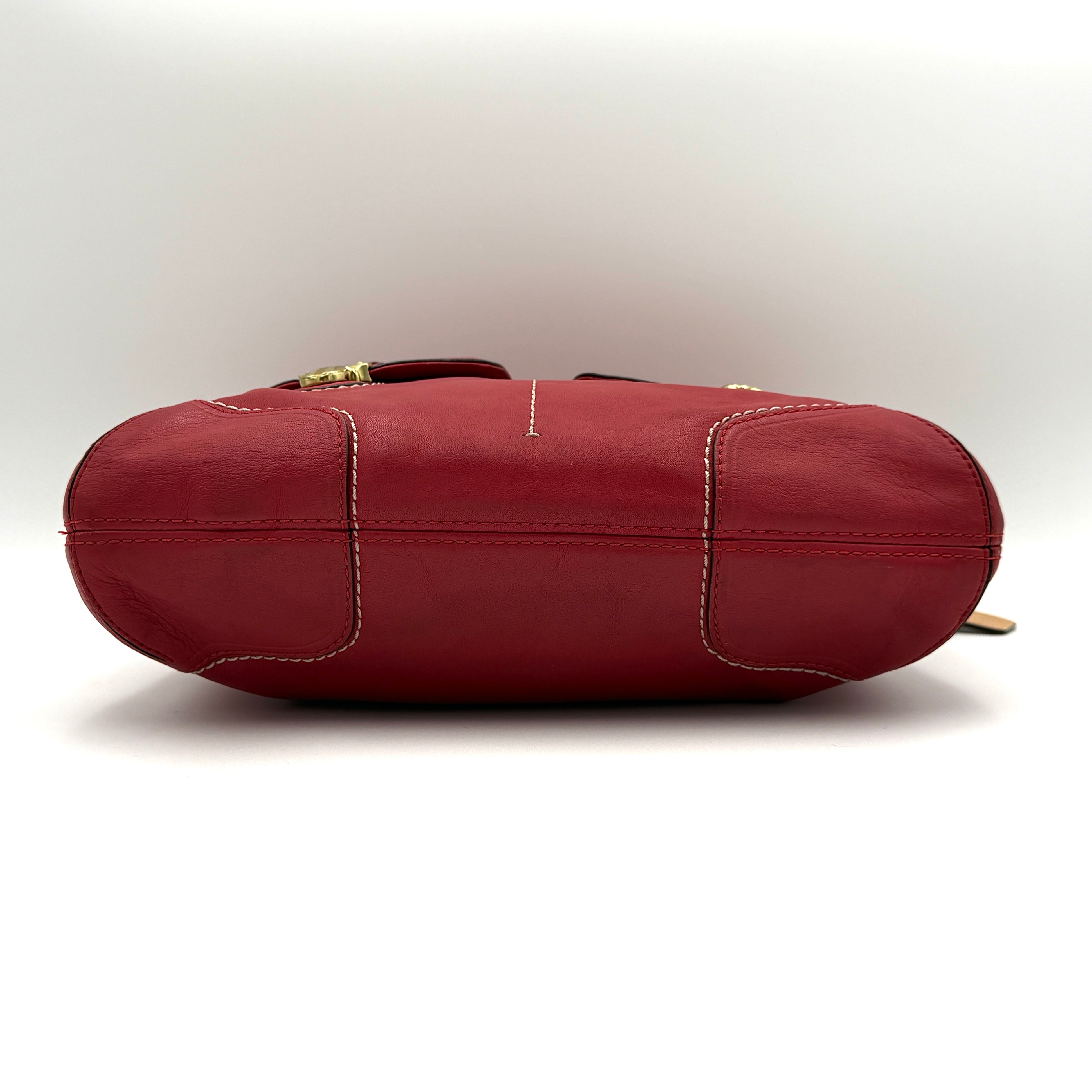 Coach Ashley Double Pocket Hobo in vibrant red leather, featuring distinctive front pockets, gold-tone hardware, and signature Coach hangtags.