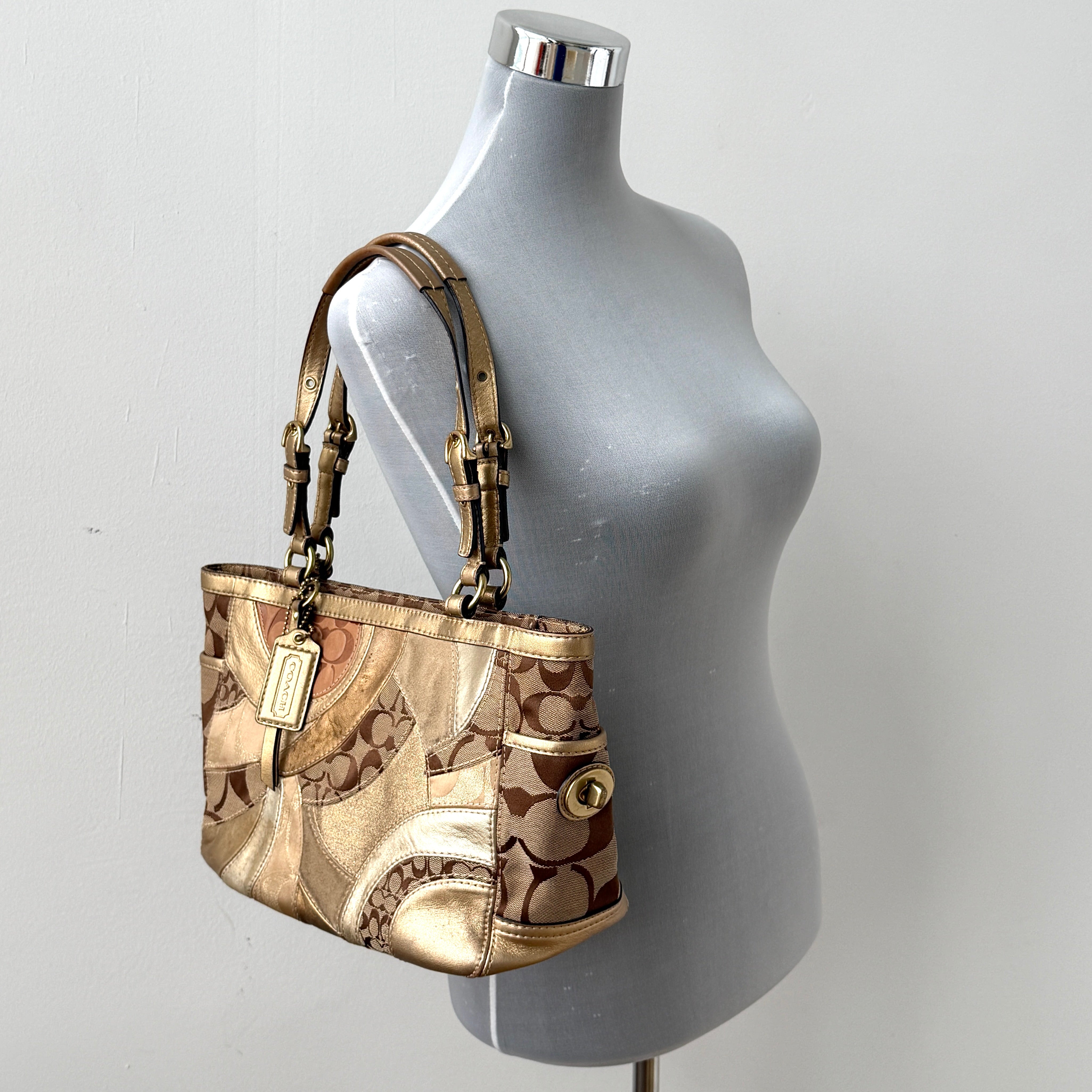 Coach Gallery Tote in mosaic patchwork jacquard and gold leather with signature charms and adjustable handles.