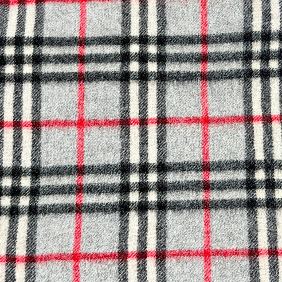 Burberry London grey Nova Check cashmere scarf with classic check pattern and fringe ends, shown carefully folded.