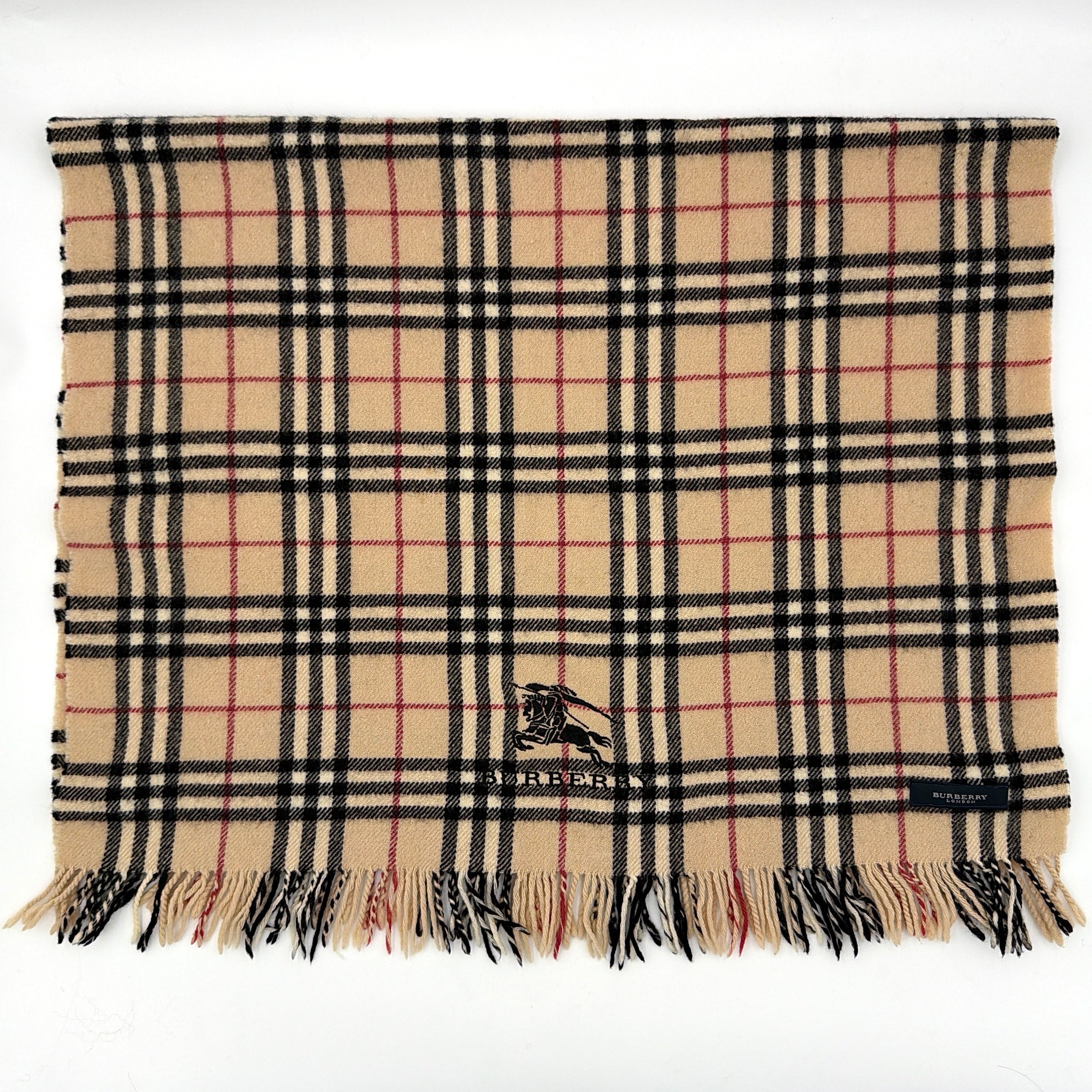 Burberry Nova Check wool scarf with fringed edges and embroidered logo in a beige, black, and red tartan pattern.