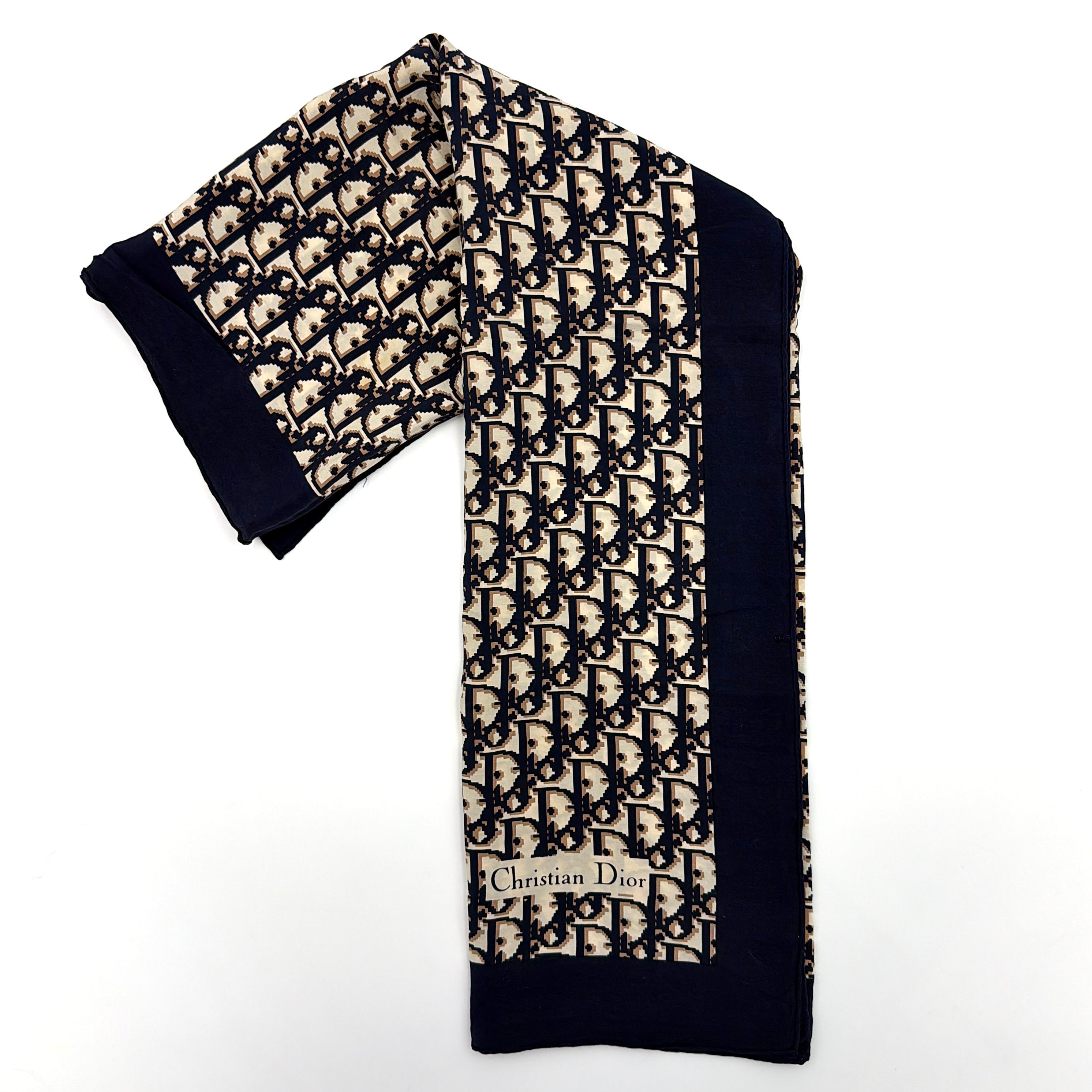 Dior Monogram Silk Scarf in navy blue and cream, featuring the classic oblique CD pattern and a navy border with a Christian Dior signature.