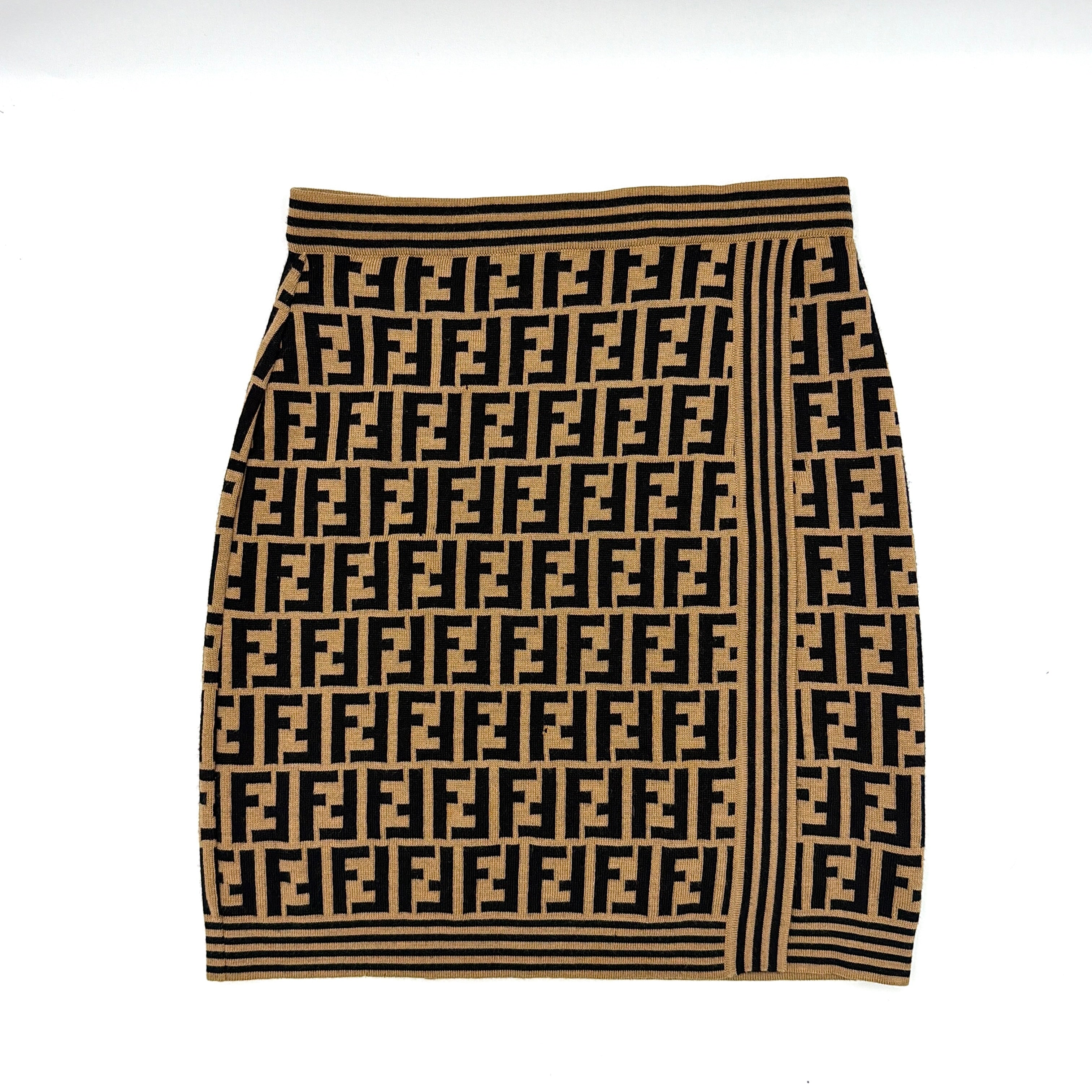 Fendi brown knit skirt with bold black FF Zucca monogram and side stripe detail, displayed flat to showcase its sculpted silhouette.