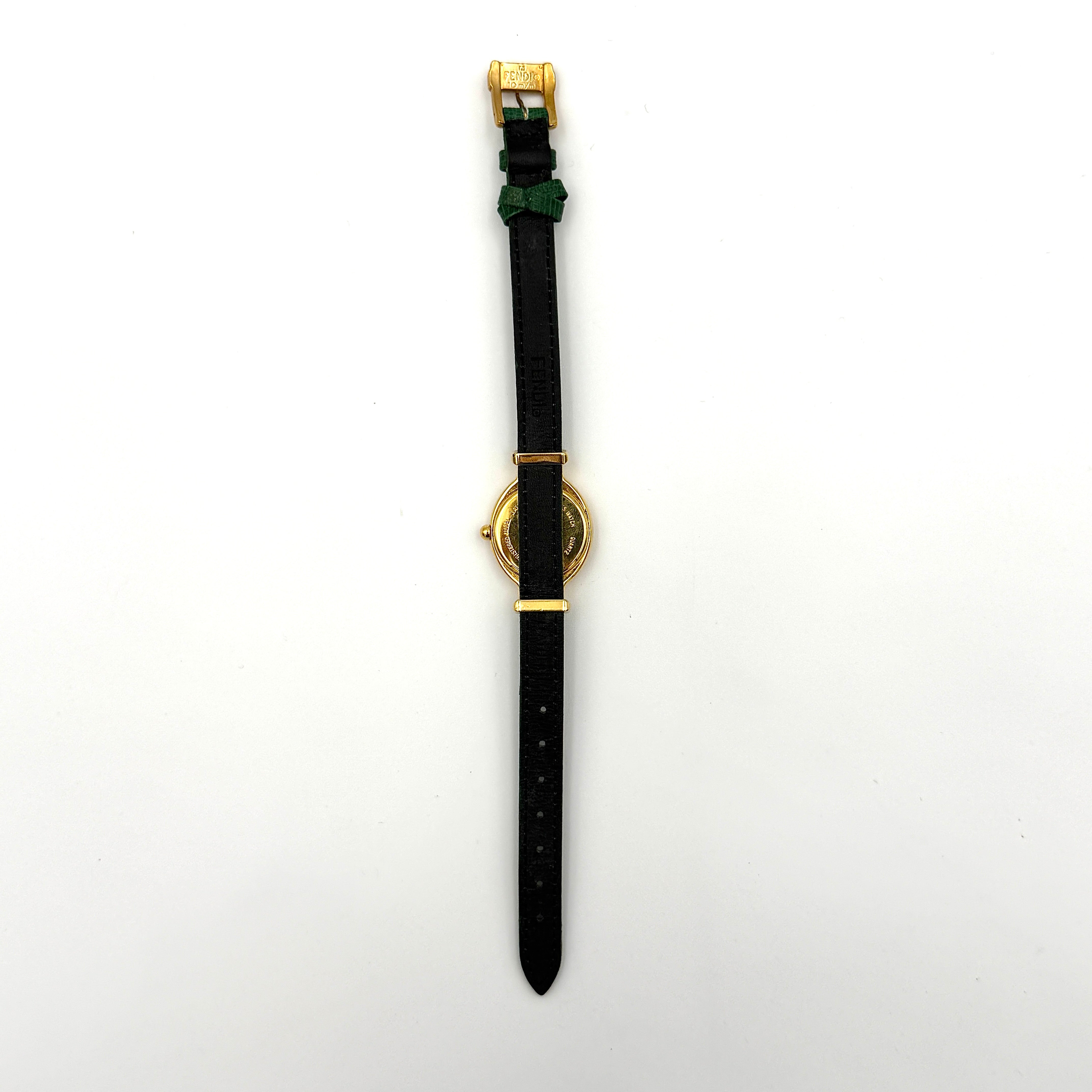 Fendi 640L Chameleon watch with five colored leather straps and gold-tone case displayed in a row.