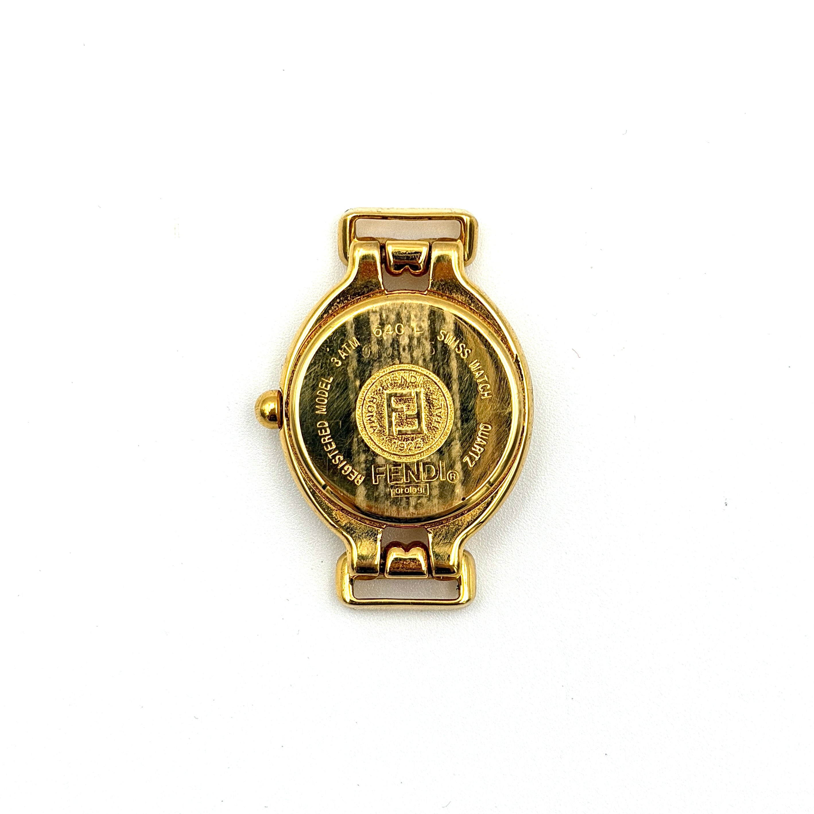 Fendi 640L Chameleon watch with five colored leather straps and gold-tone case displayed in a row.