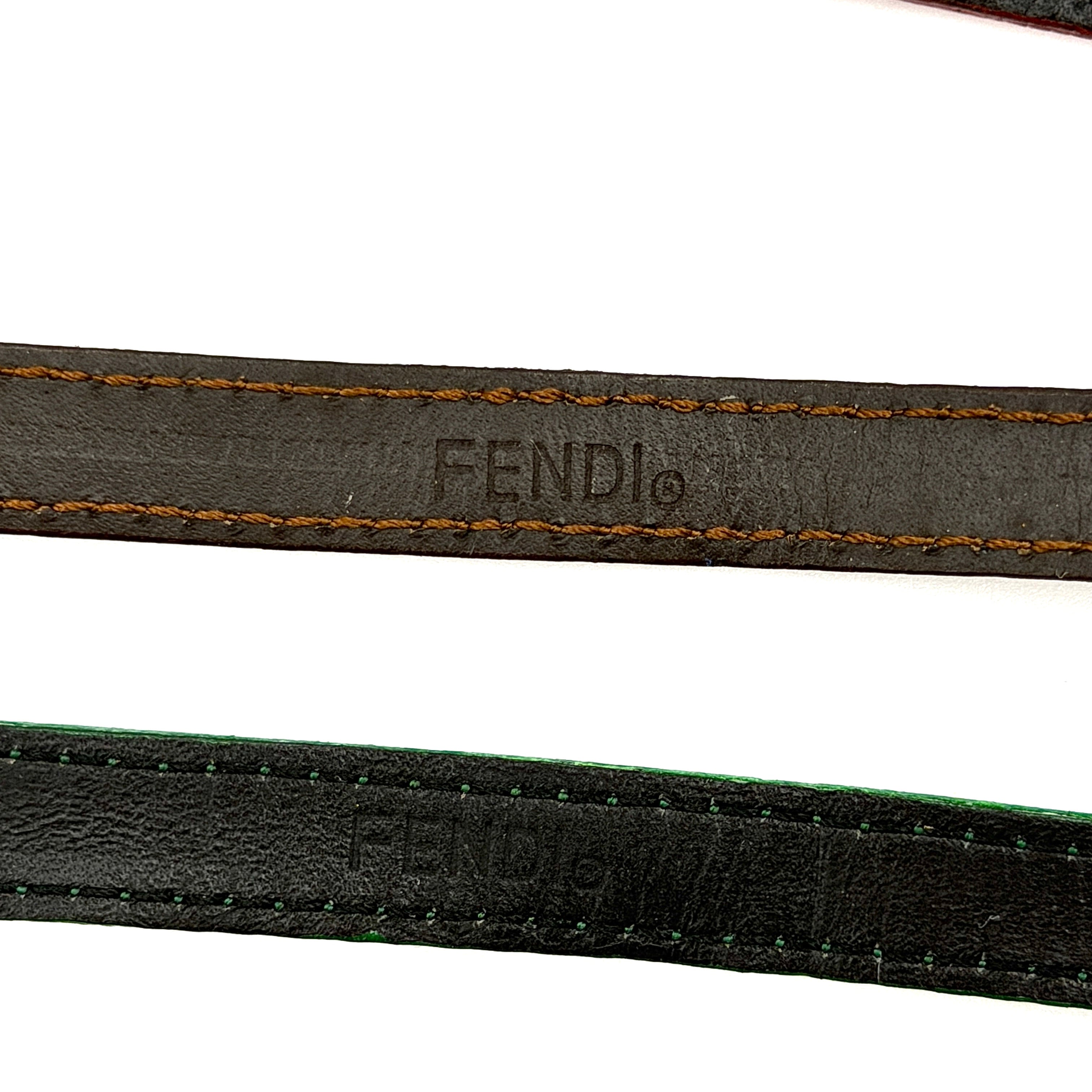 Fendi 640L Chameleon watch with five colored leather straps and gold-tone case displayed in a row.