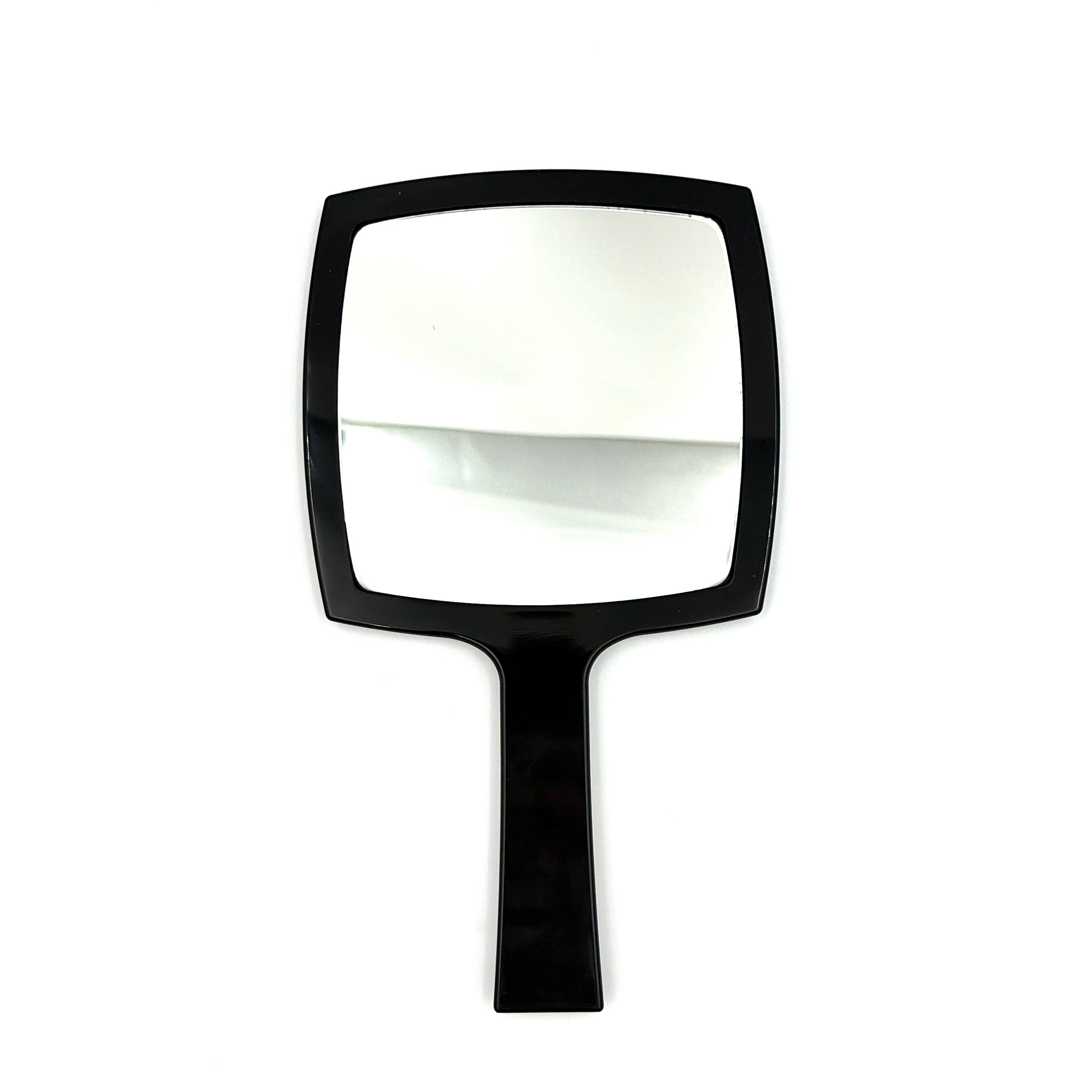 Chanel black hand mirror with white double C logo, presented in its original box with a yellow interior lining.