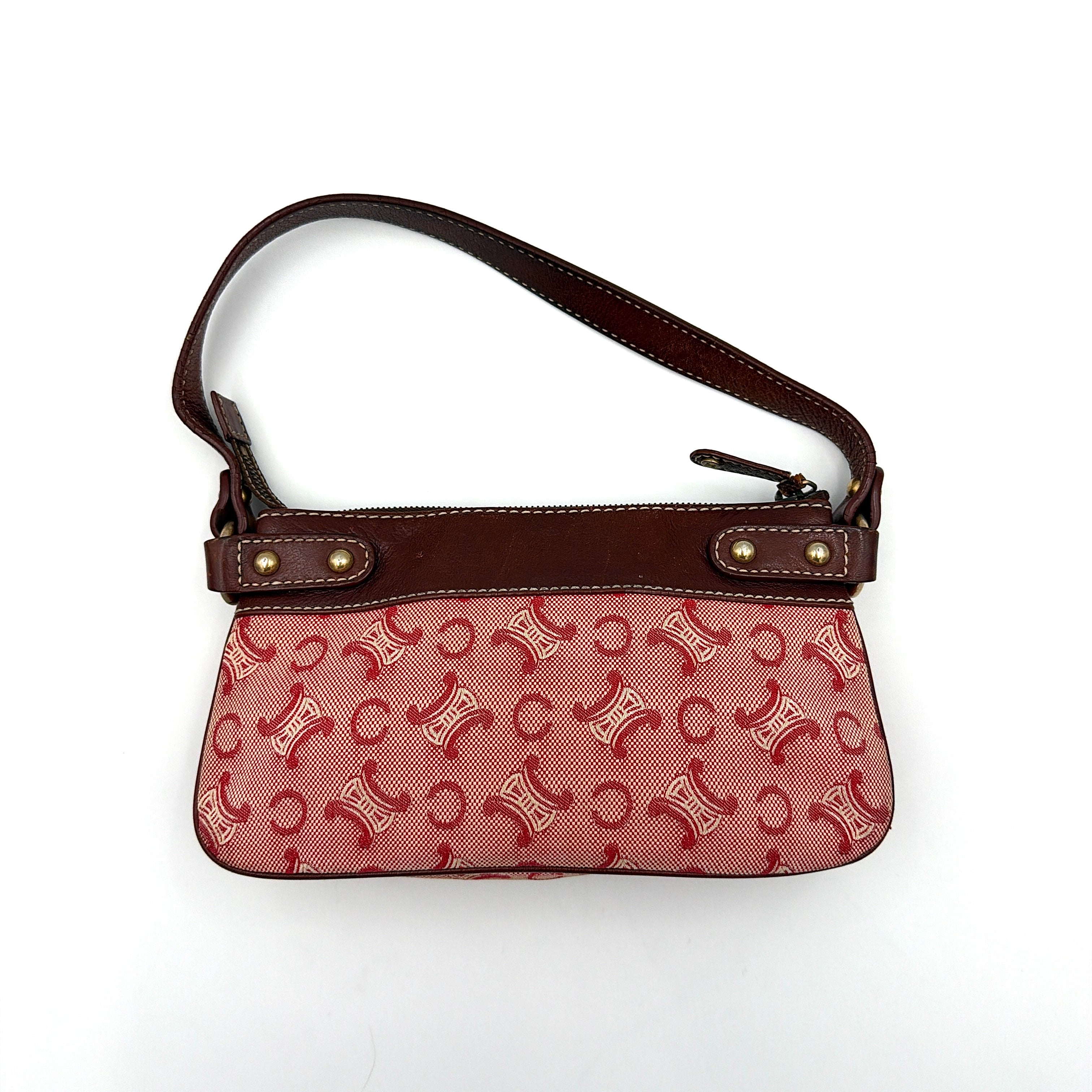 Celine Macadam shoulder bag in red coated canvas with brown leather trim and gold-tone hardware.