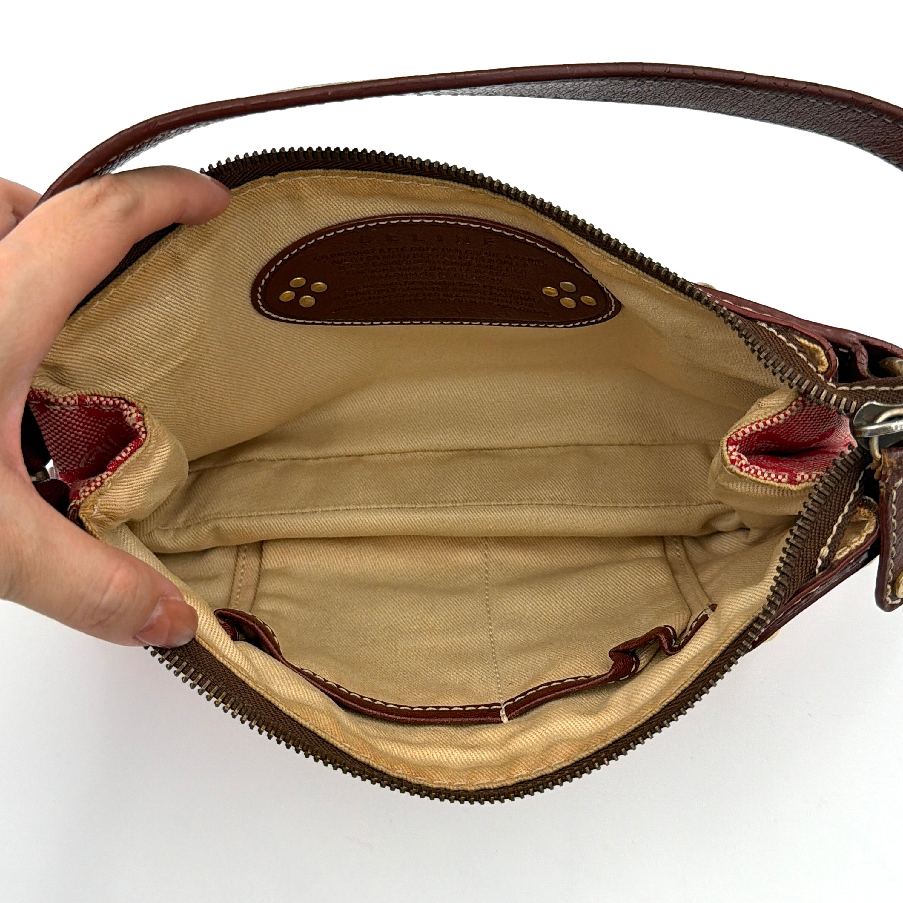 Celine Macadam shoulder bag in red coated canvas with brown leather trim and gold-tone hardware.