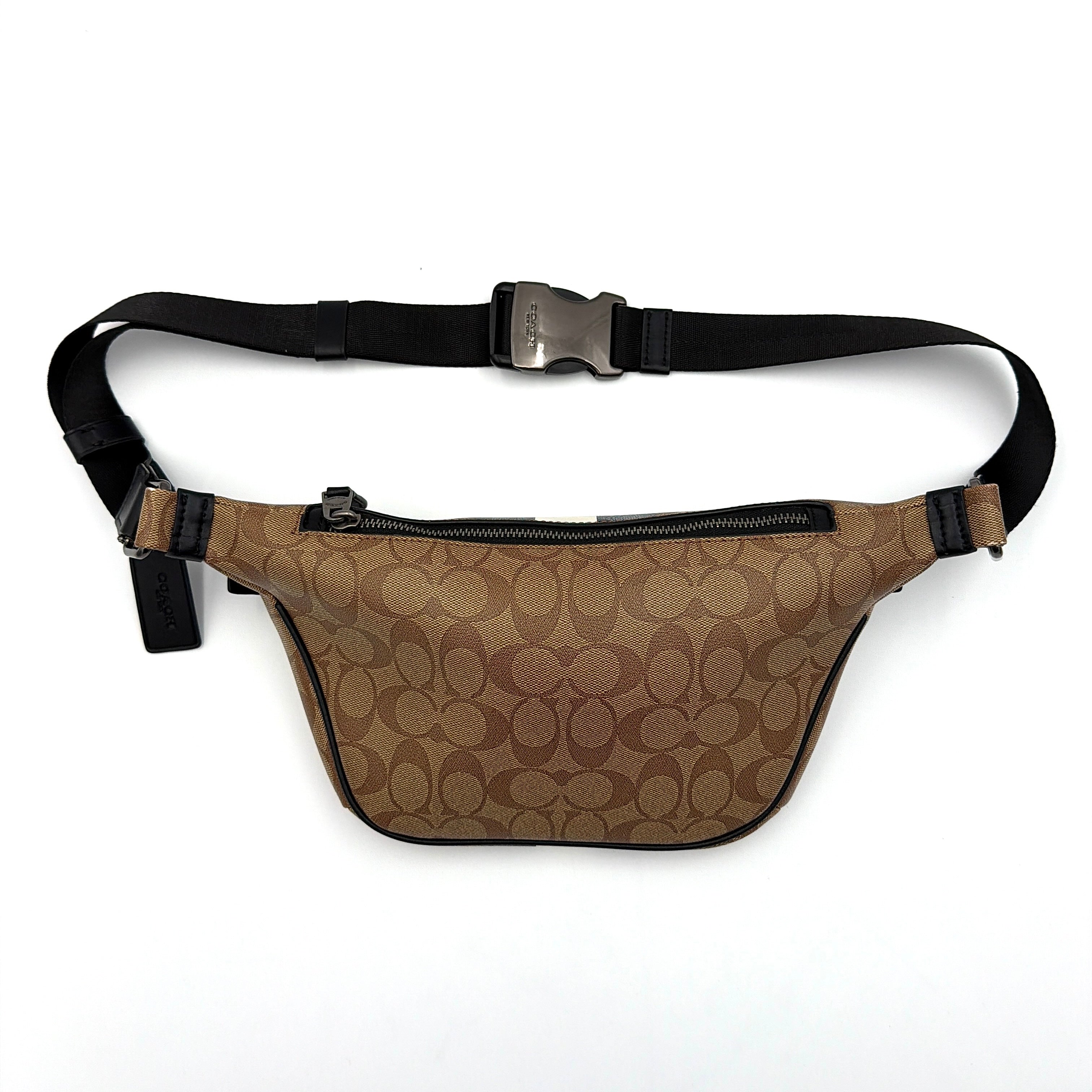 Coach Signature Warren Stripe Belt Bag in beige canvas with black and ivory vertical stripes and adjustable black strap.