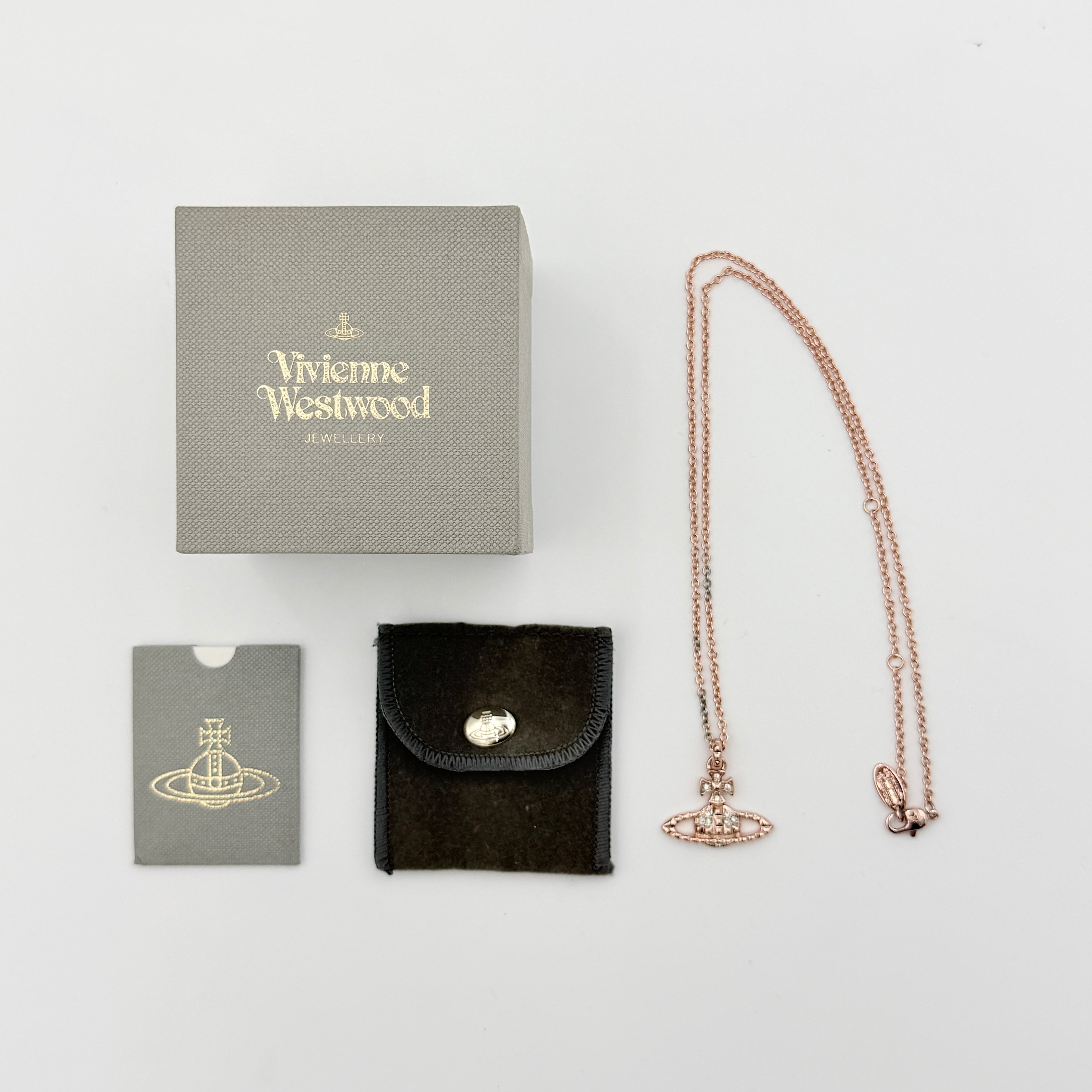 Vivienne Westwood Orb Necklace in rose gold and silver, presented on a fine chain with the signature crystal-embellished pendant.