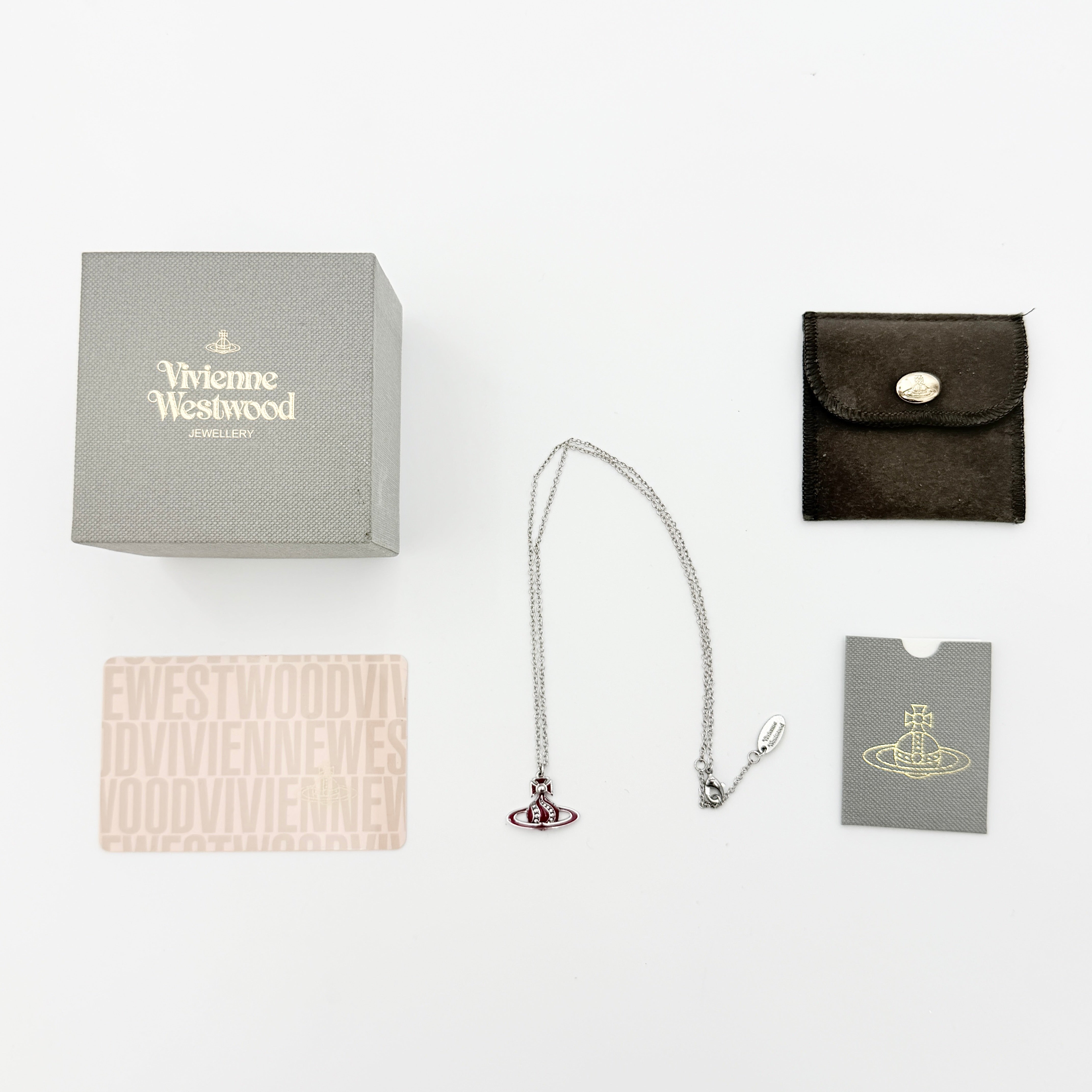 Vivienne Westwood Orb Enamel Necklace in burgundy and silver, featuring the signature orb pendant on a fine chain.