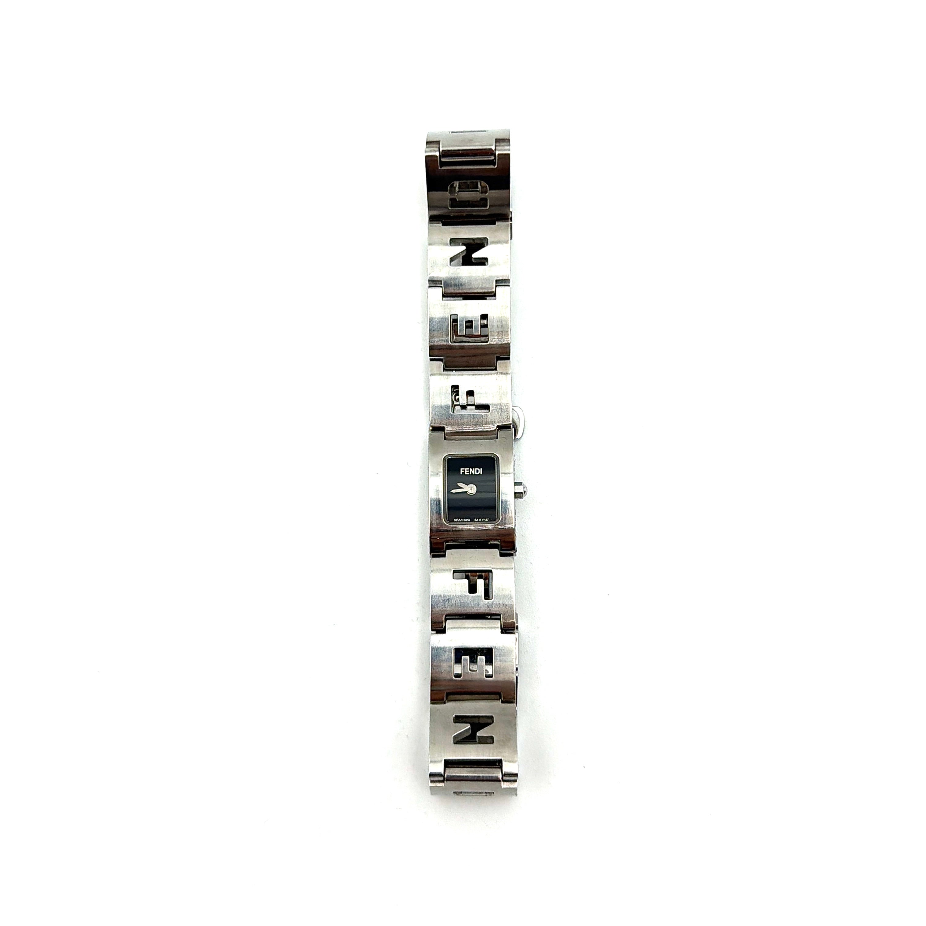 Fendi 3150L FF Logo Belt Watch in silver with a black dial, presented in a black Fendi box with gold logo accents.