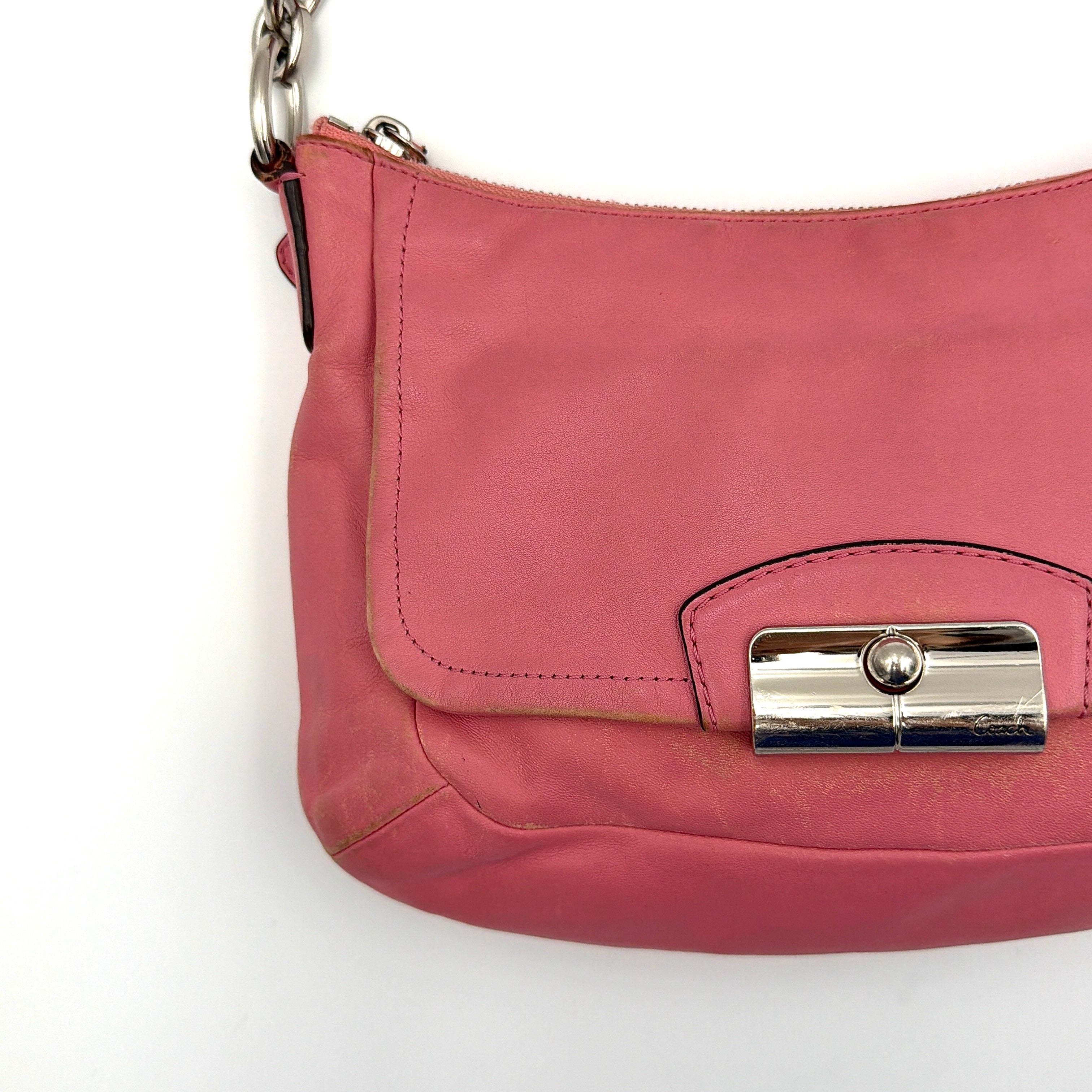 Coach Kristin 2Way Shoulder Bag in pink leather with silver hardware and detachable strap, displayed with both handle and crossbody option.
