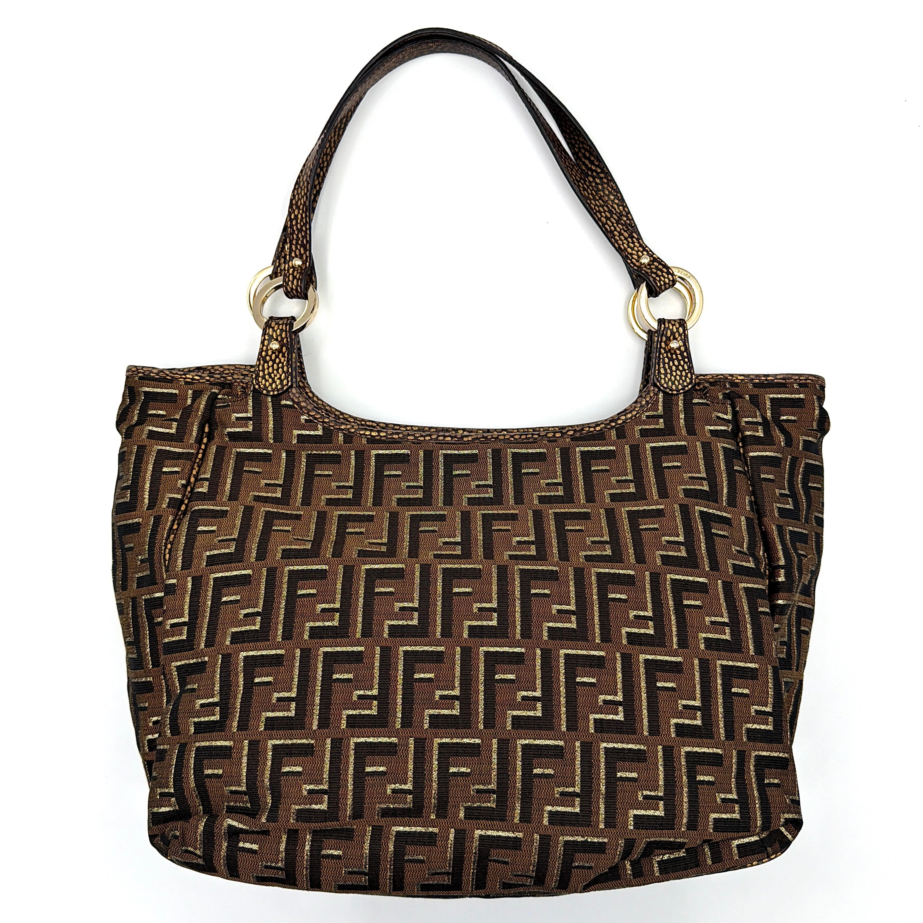 The Fendi FF Zucca Chef Shoulder Bag in brown jacquard canvas with all-over FF monogram, leather trim, and gold-tone ring handles.