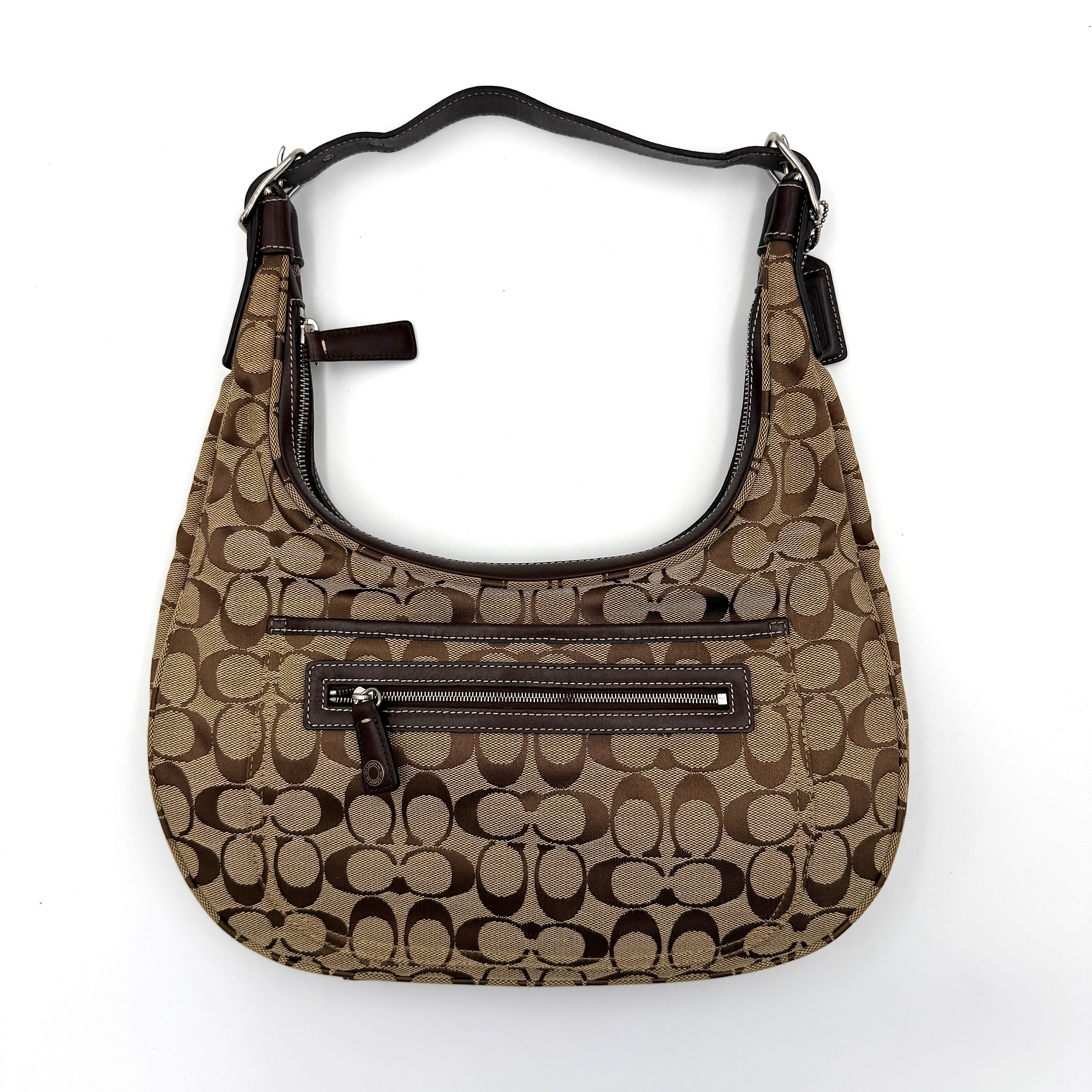 Coach Signature Hamilton Hobo Shoulder Bag in beige and brown jacquard, showcasing the iconic 'C' monogram with leather trim and silver hardware.