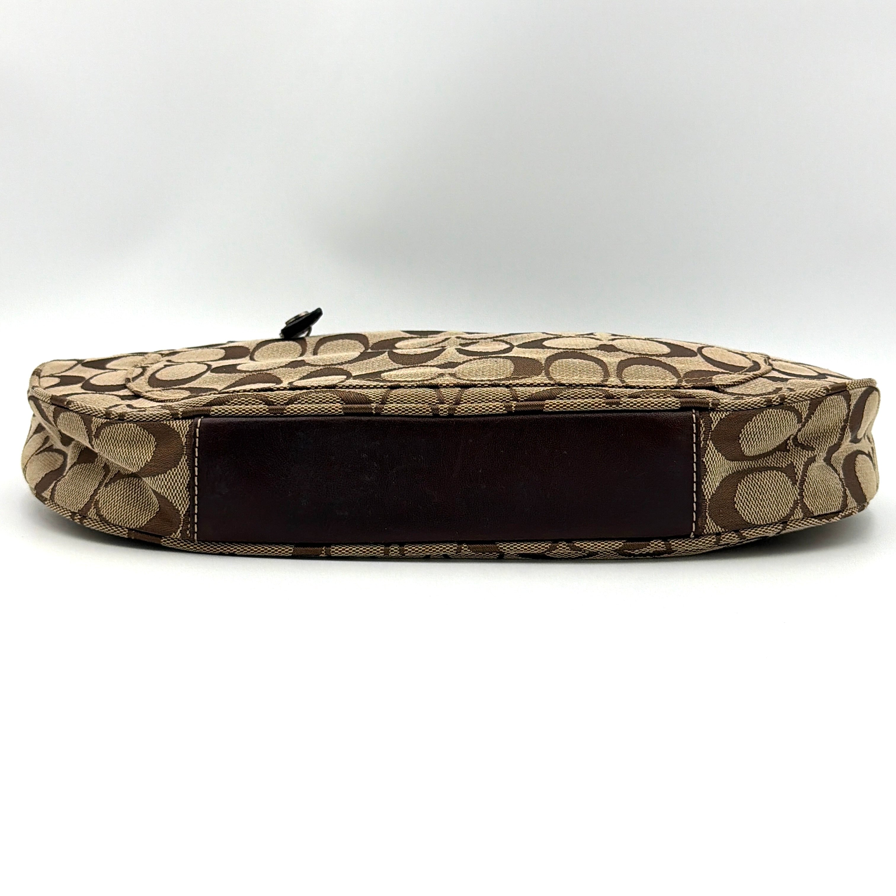 Coach Signature Hamilton Hobo Shoulder Bag in beige and brown jacquard, showcasing the iconic 'C' monogram with leather trim and silver hardware.