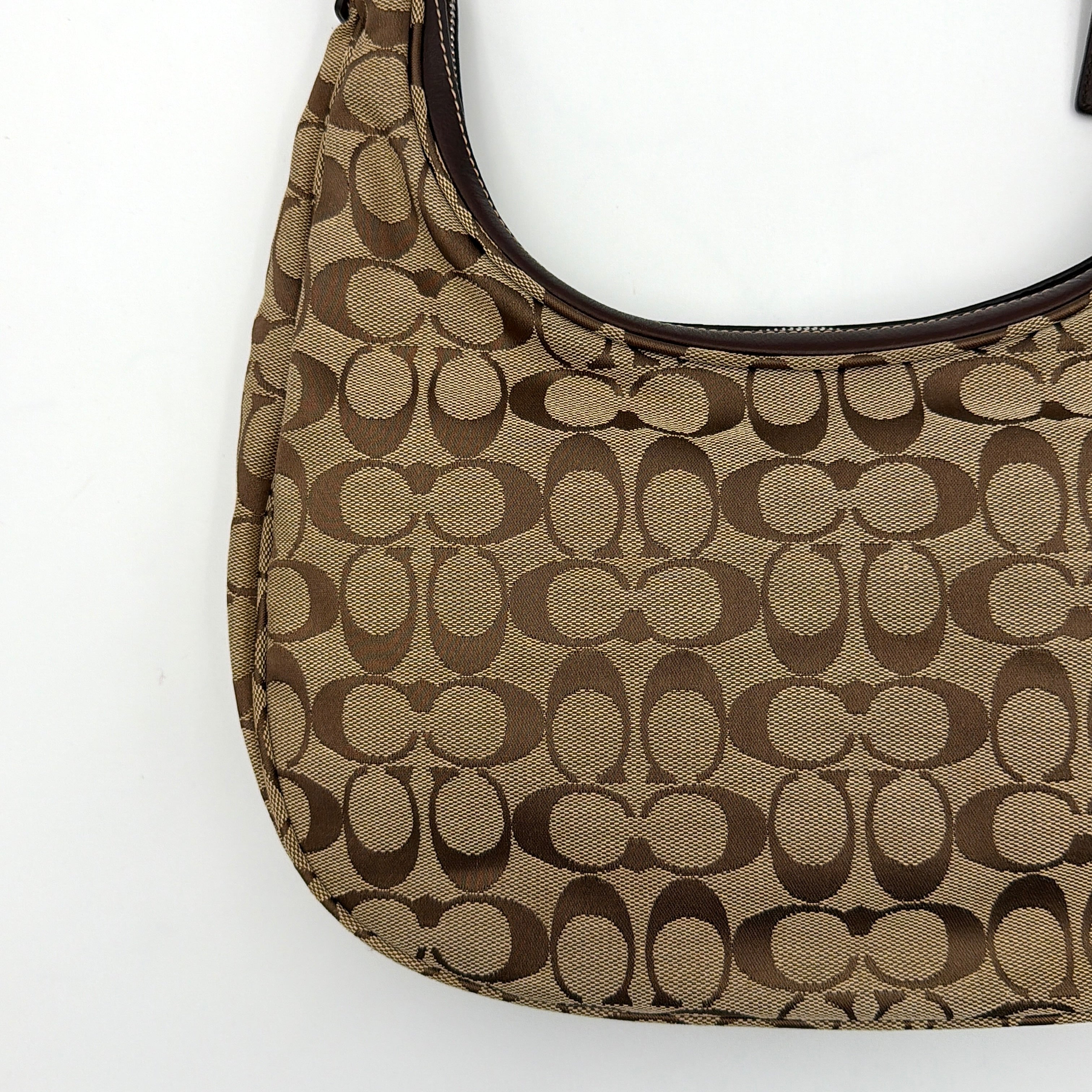 Coach Signature Hamilton Hobo Shoulder Bag in beige and brown jacquard, showcasing the iconic 'C' monogram with leather trim and silver hardware.