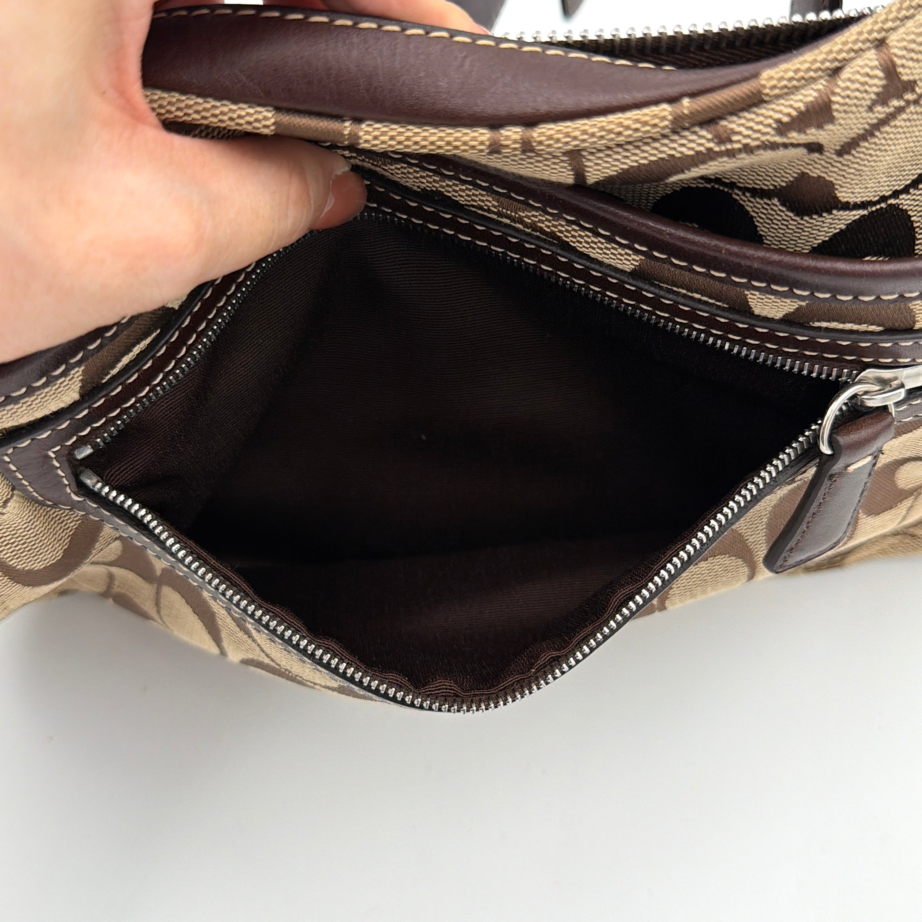 Coach Signature Hamilton Hobo Shoulder Bag in beige and brown jacquard, showcasing the iconic 'C' monogram with leather trim and silver hardware.