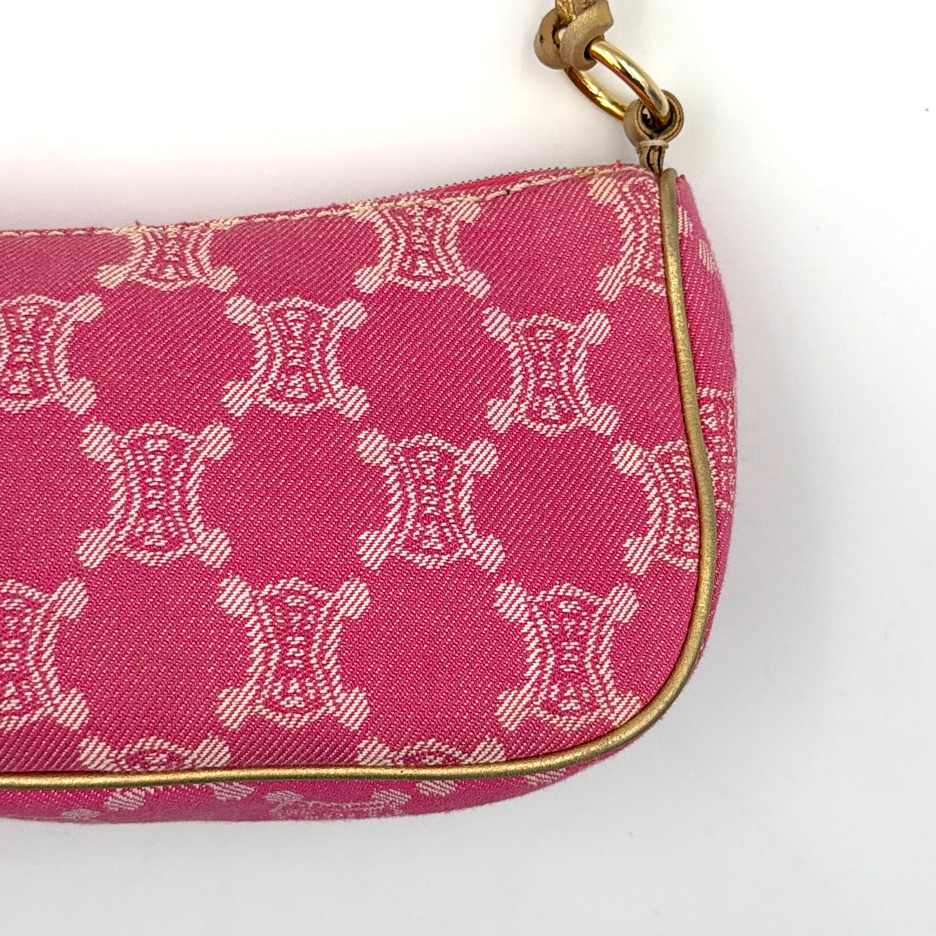Front view of the Celine Macadam pink denim shoulder bag with gold-tone leather strap and triomphe monogram print.