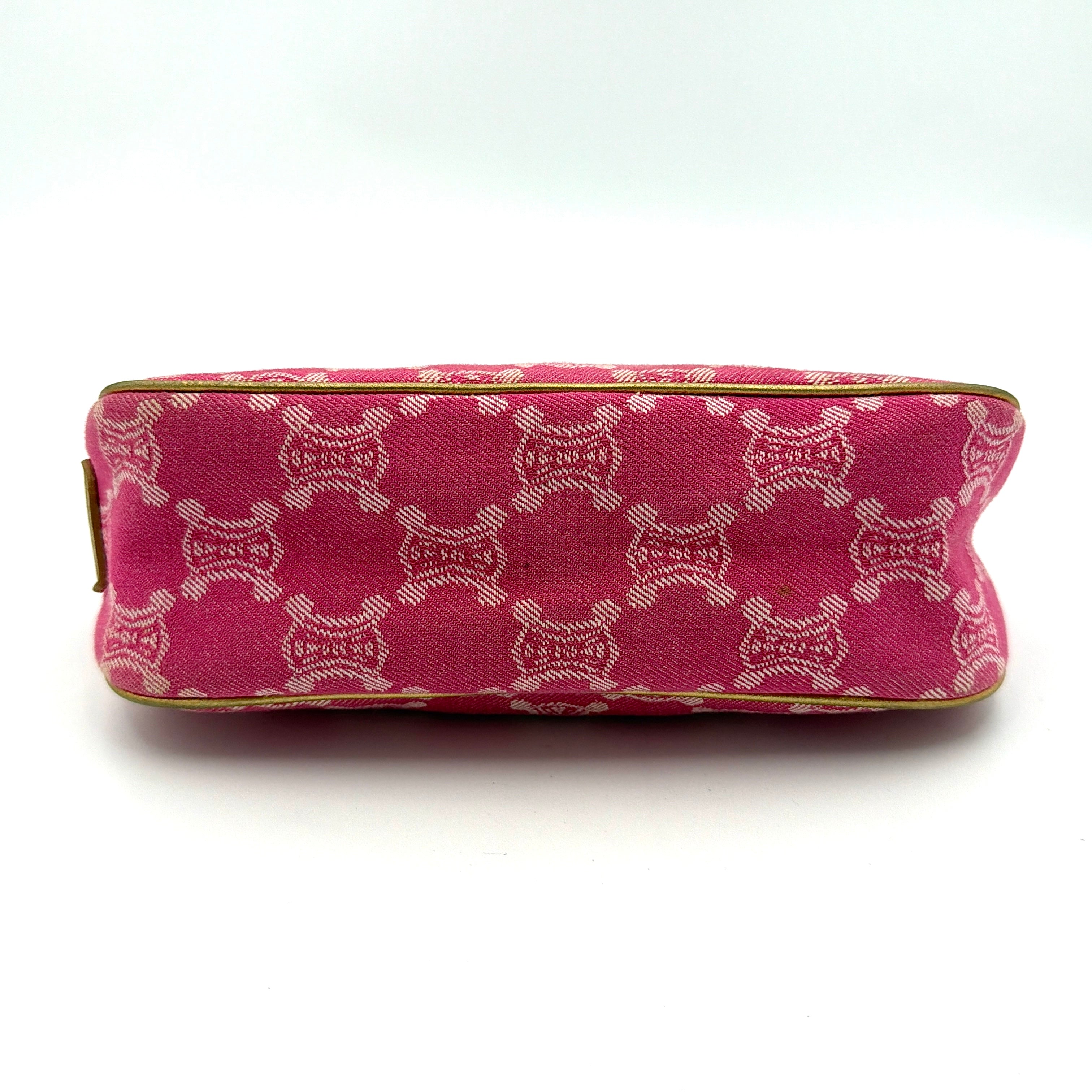 Front view of the Celine Macadam pink denim shoulder bag with gold-tone leather strap and triomphe monogram print.