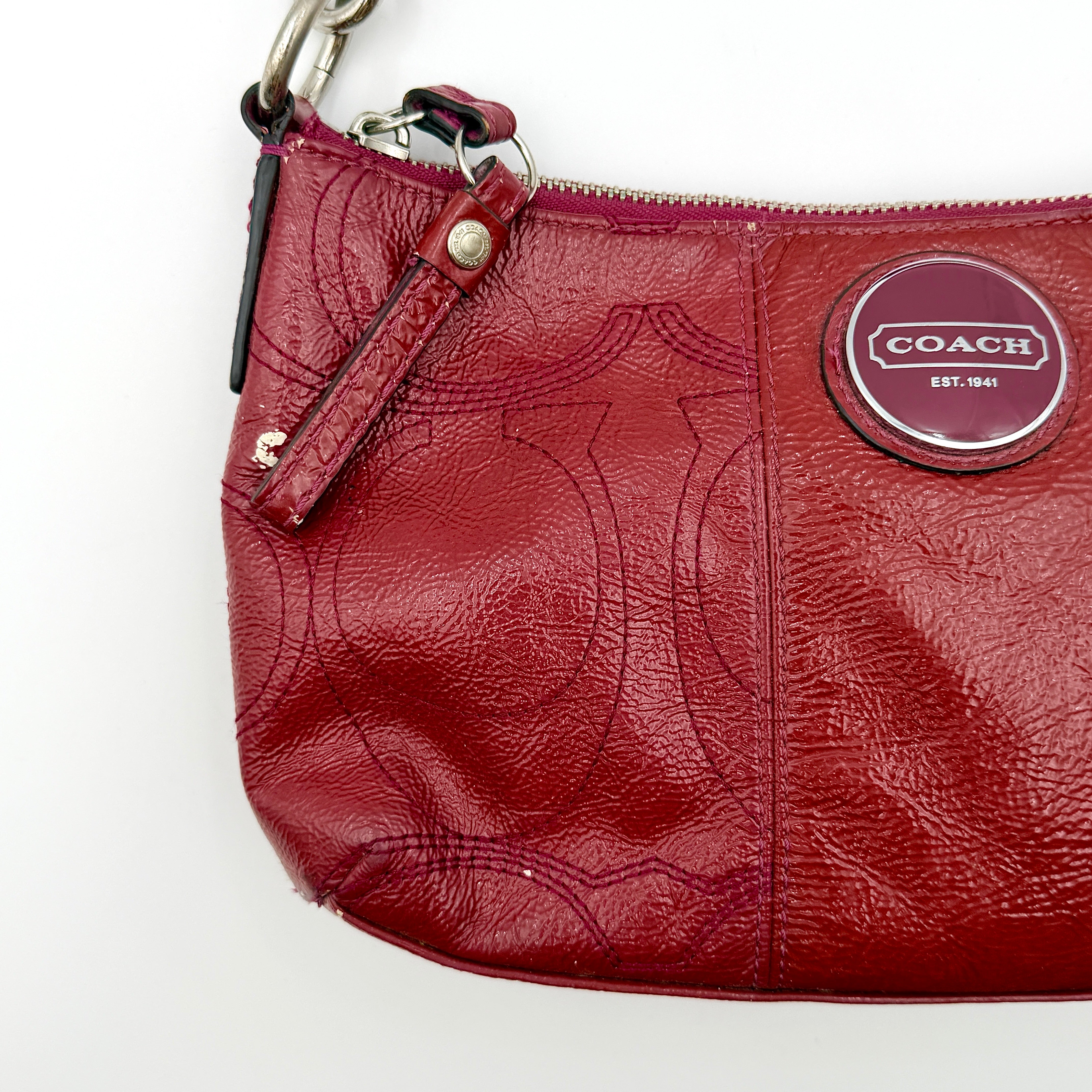 Coach 2Way Signature Stripe Shoulder Bag in red leather with detachable strap, shown against a white background.
