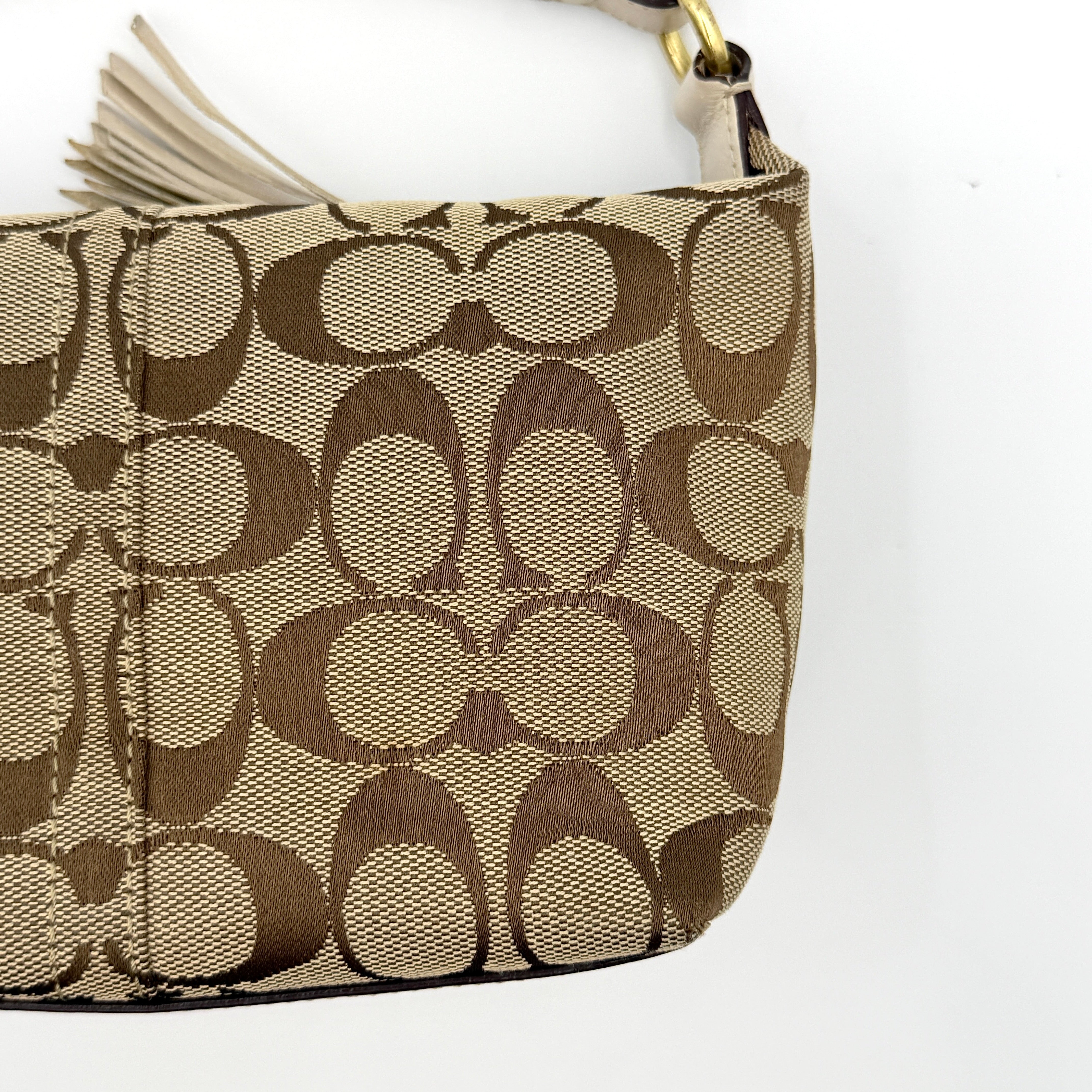 Coach Signature Stripe Mini Hobo Shoulder Bag in beige and gold with monogram canvas, cream leather trim, and gold stripes.