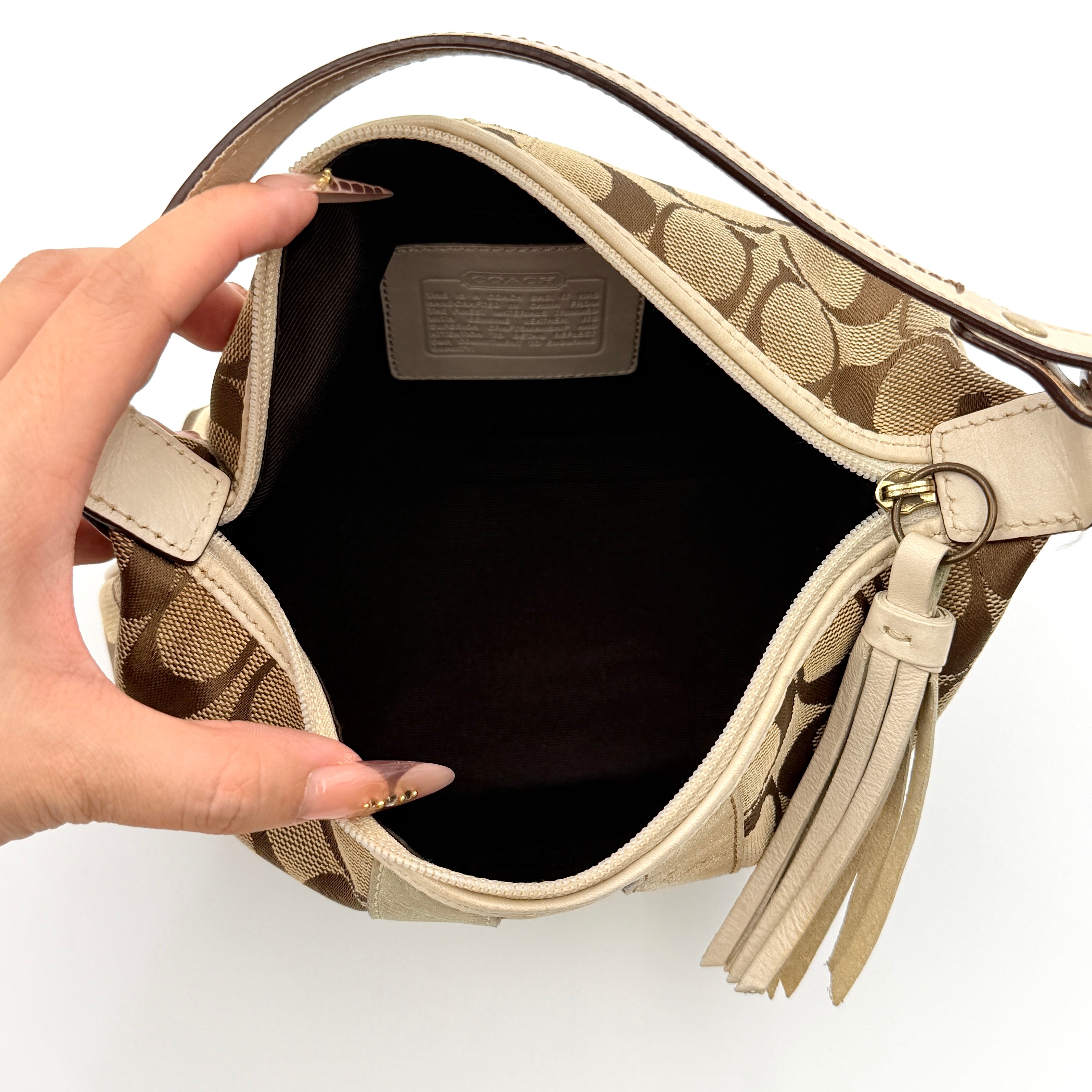 Coach Signature Stripe Mini Hobo Shoulder Bag in beige and gold with monogram canvas, cream leather trim, and gold stripes.